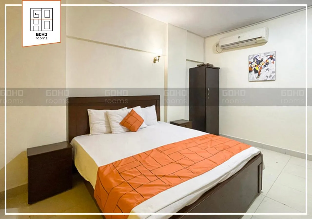 Bed in GOHO Rooms 10th Commercial