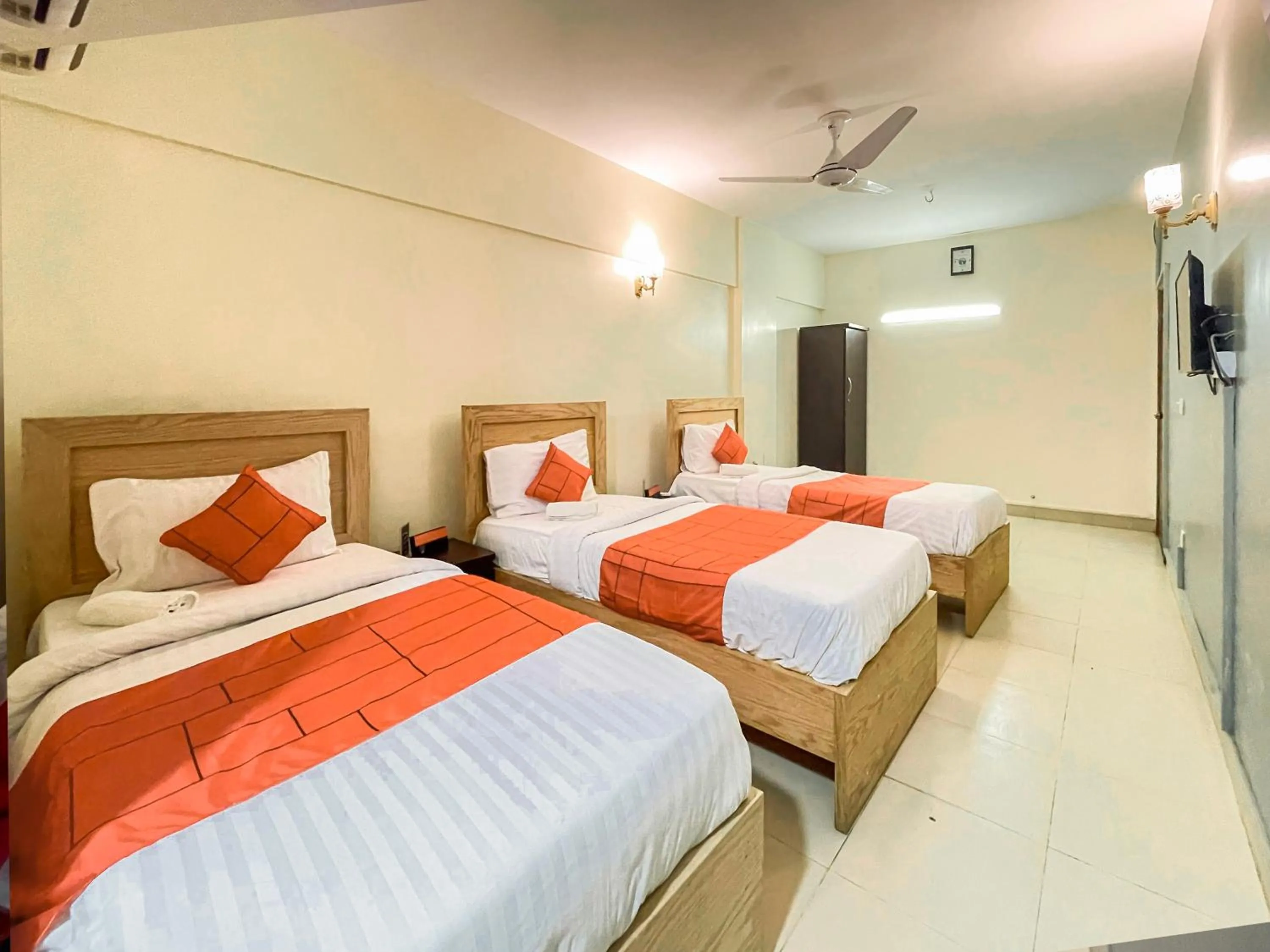 Bed in GOHO Rooms 10th Commercial