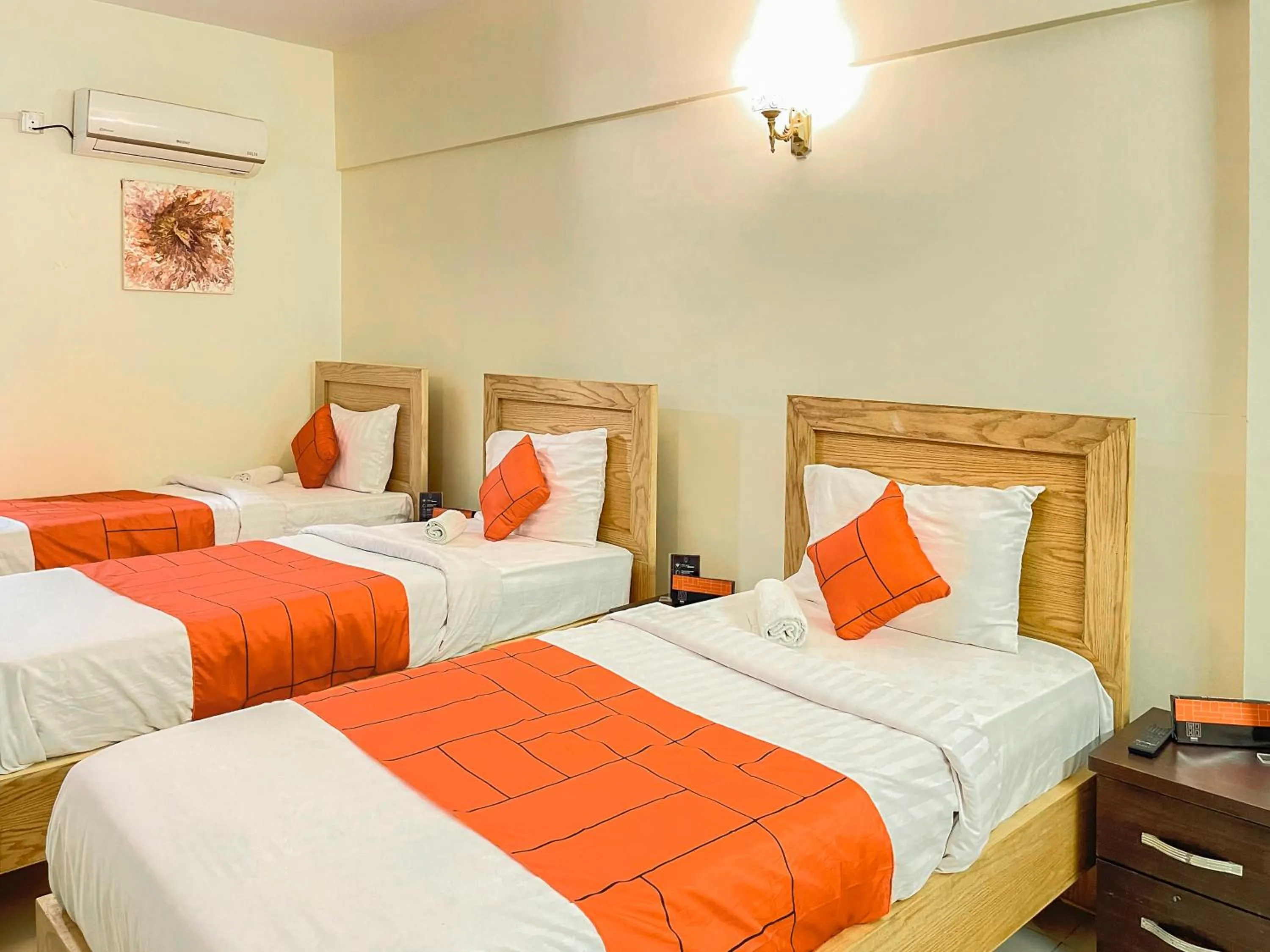 Bed in GOHO Rooms 10th Commercial