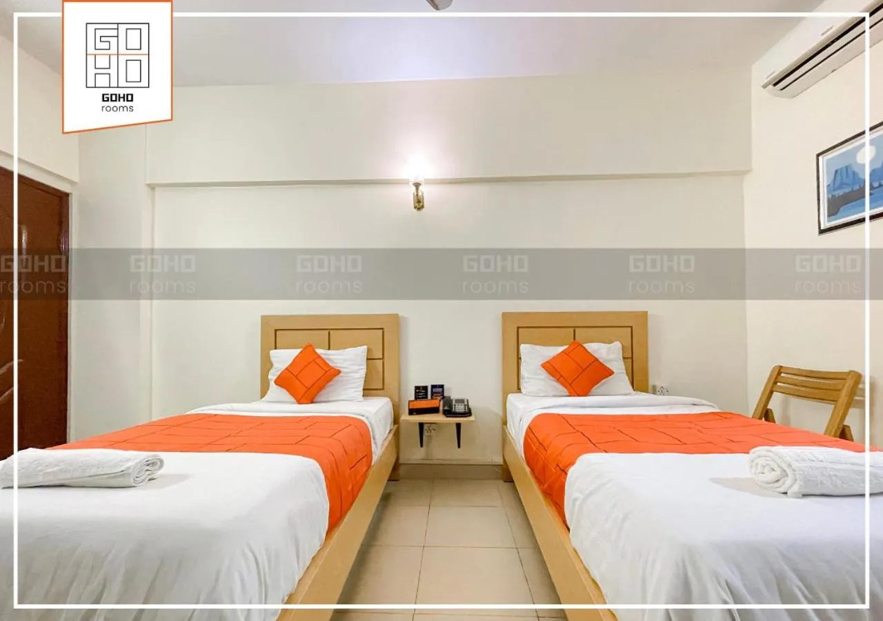 Bed in GOHO Rooms 10th Commercial