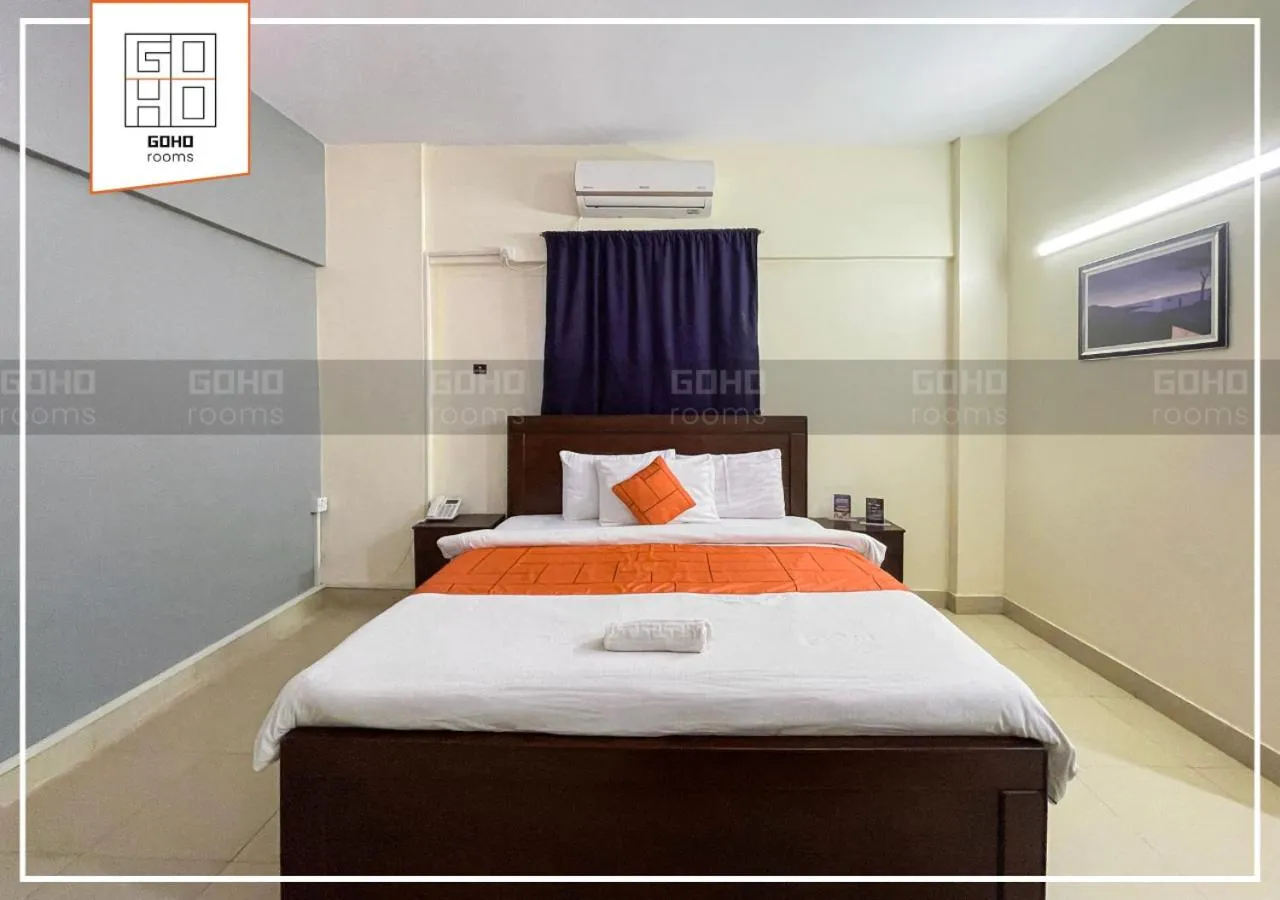 Bed in GOHO Rooms 10th Commercial