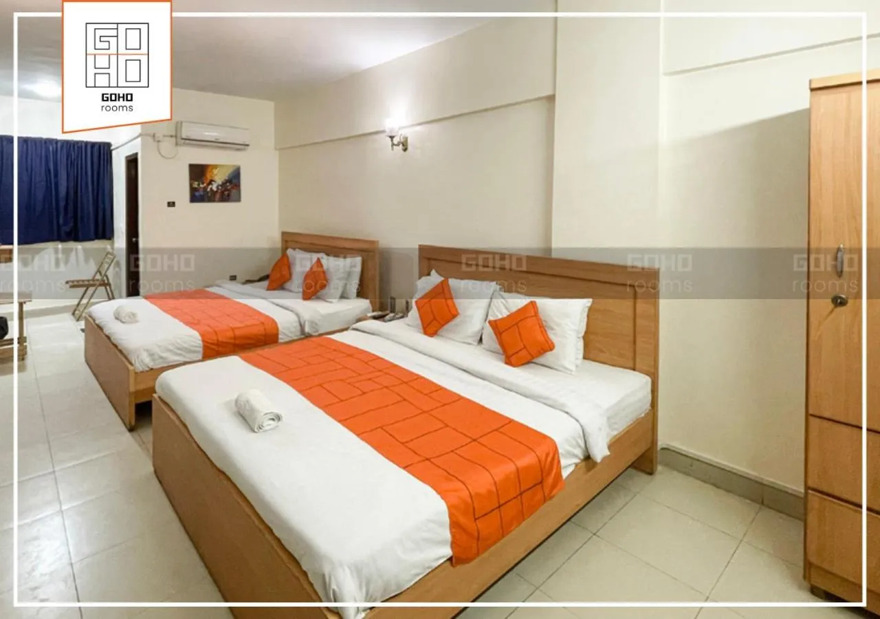 Bed in GOHO Rooms 10th Commercial