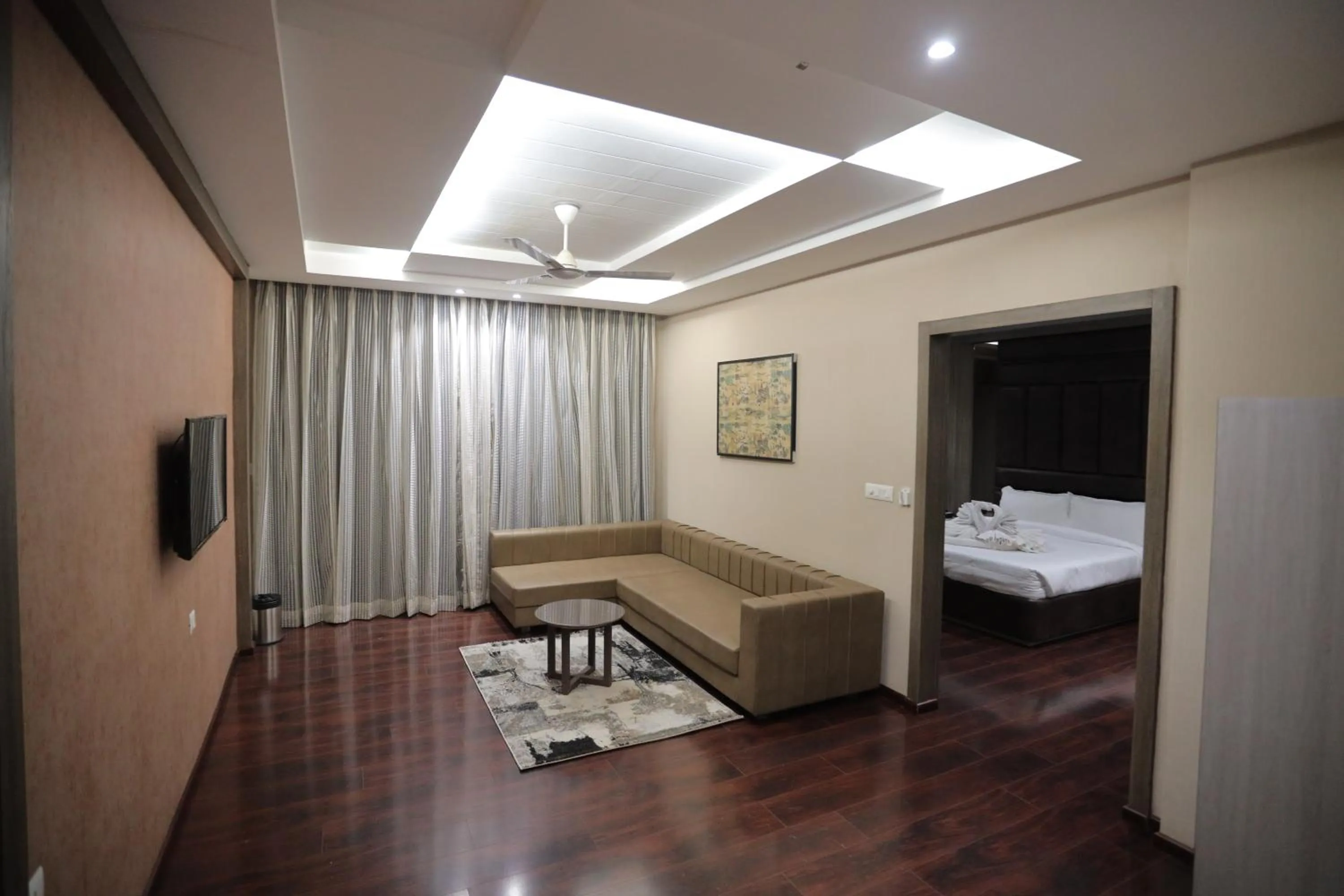 Living room, Bed in Ratnapriya hotel and resort