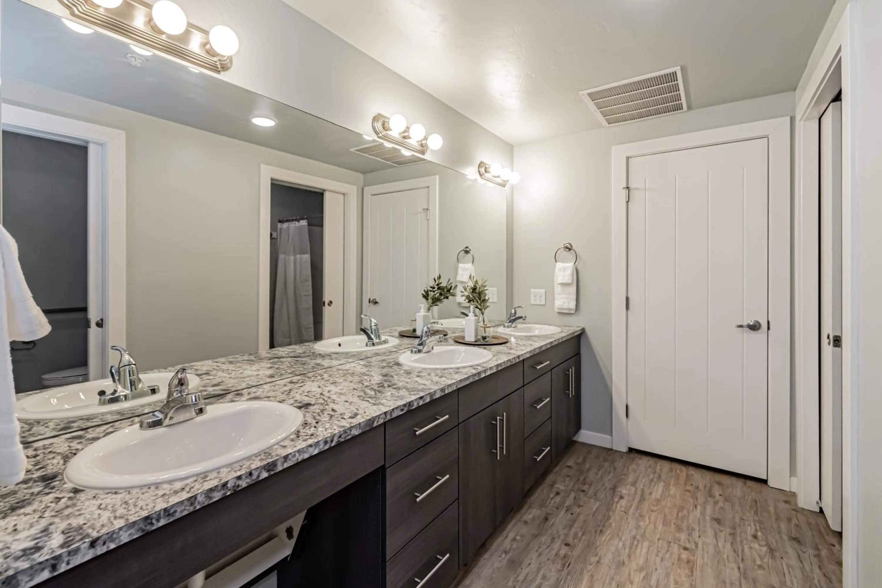 Bathroom in Bringham's Mill Apartments Perfect for Groups Full Kitchen Gym and Free Parking