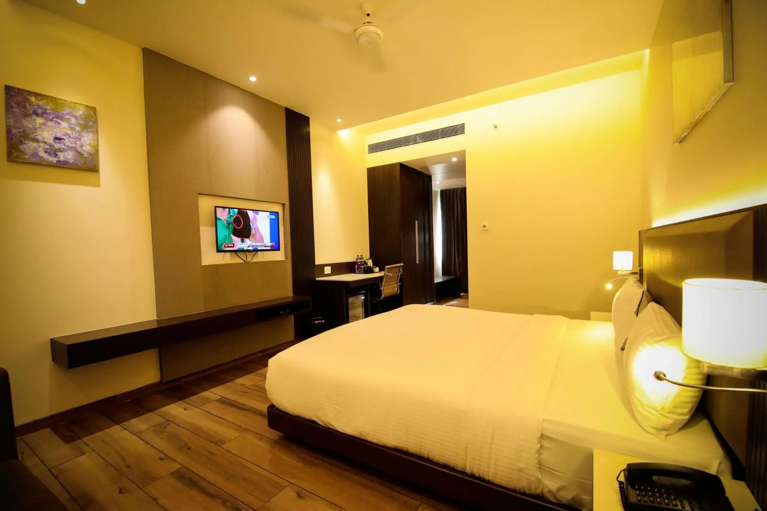 Communal lounge/ TV room, Bed in Enrise by Sayaji Rewa Communal lounge/ TV room, Bed in Enrise by Sayaji Rewa