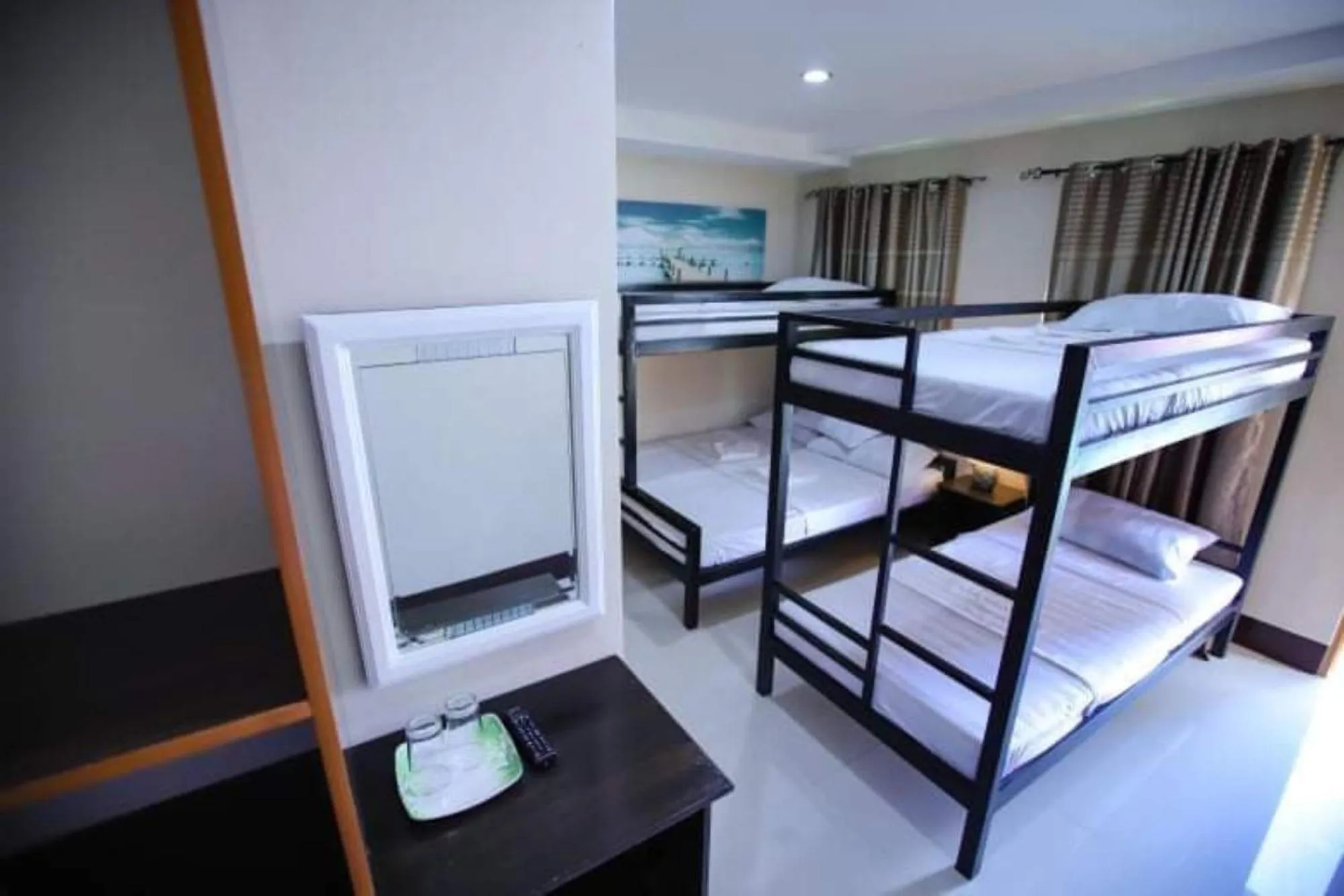 Bed in Marco s Tourist Inn by RedDoorz