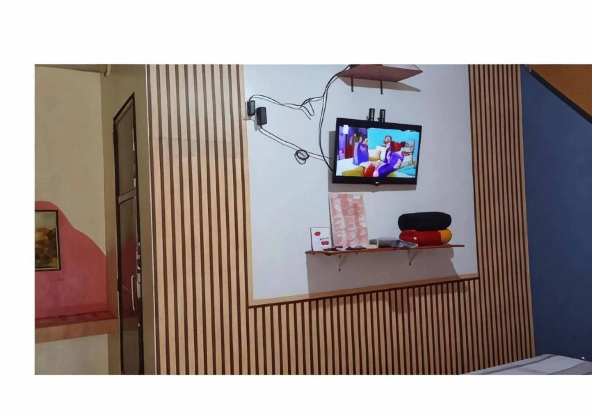 TV and multimedia in Golden Empress Hotel Urdaneta Pangasinan by RedDoorz