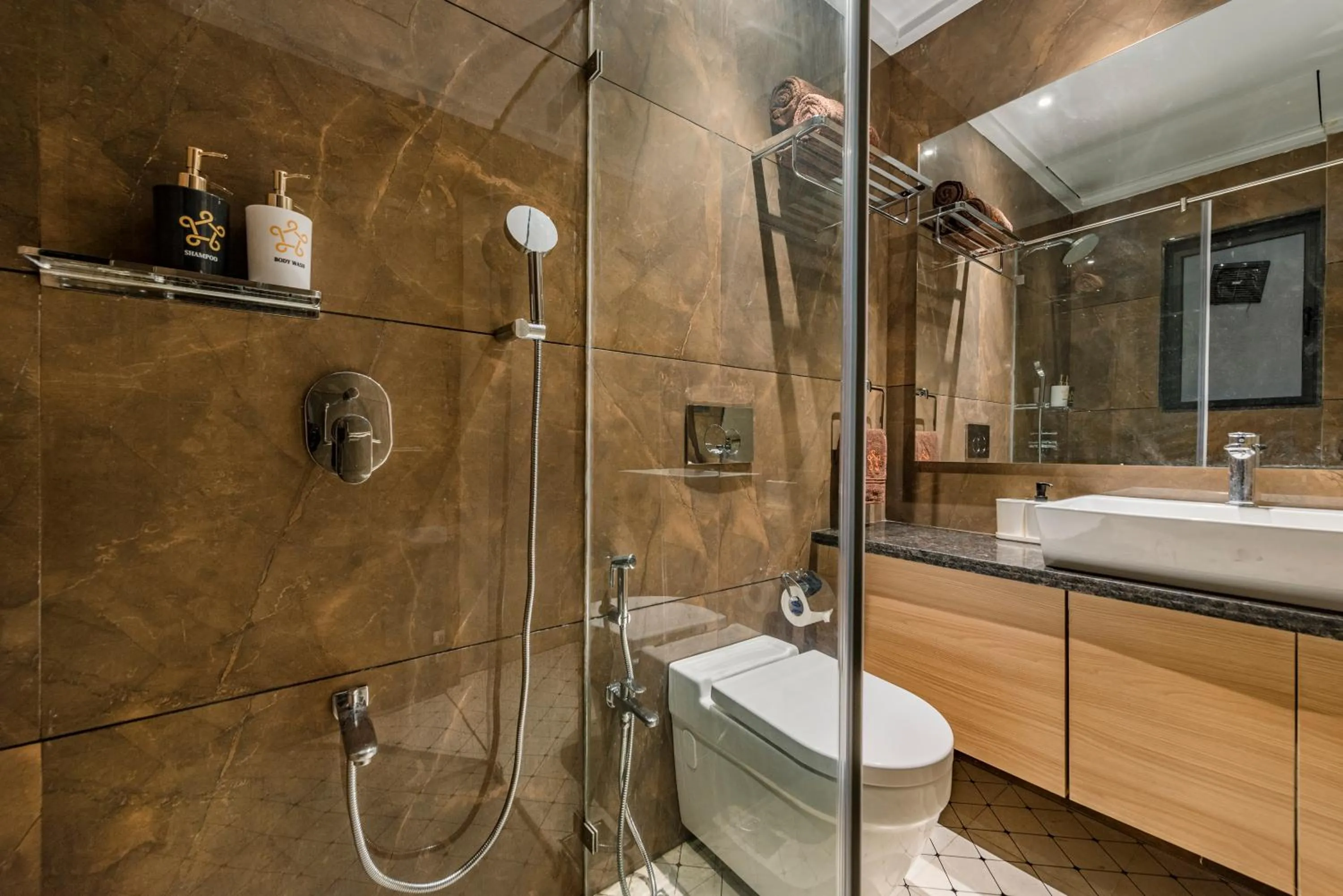 Shower in SaffronStays Nishta - 4BR pet-friendly villa with pool, turf, gazebo & terrace BBQ views in Alibaug