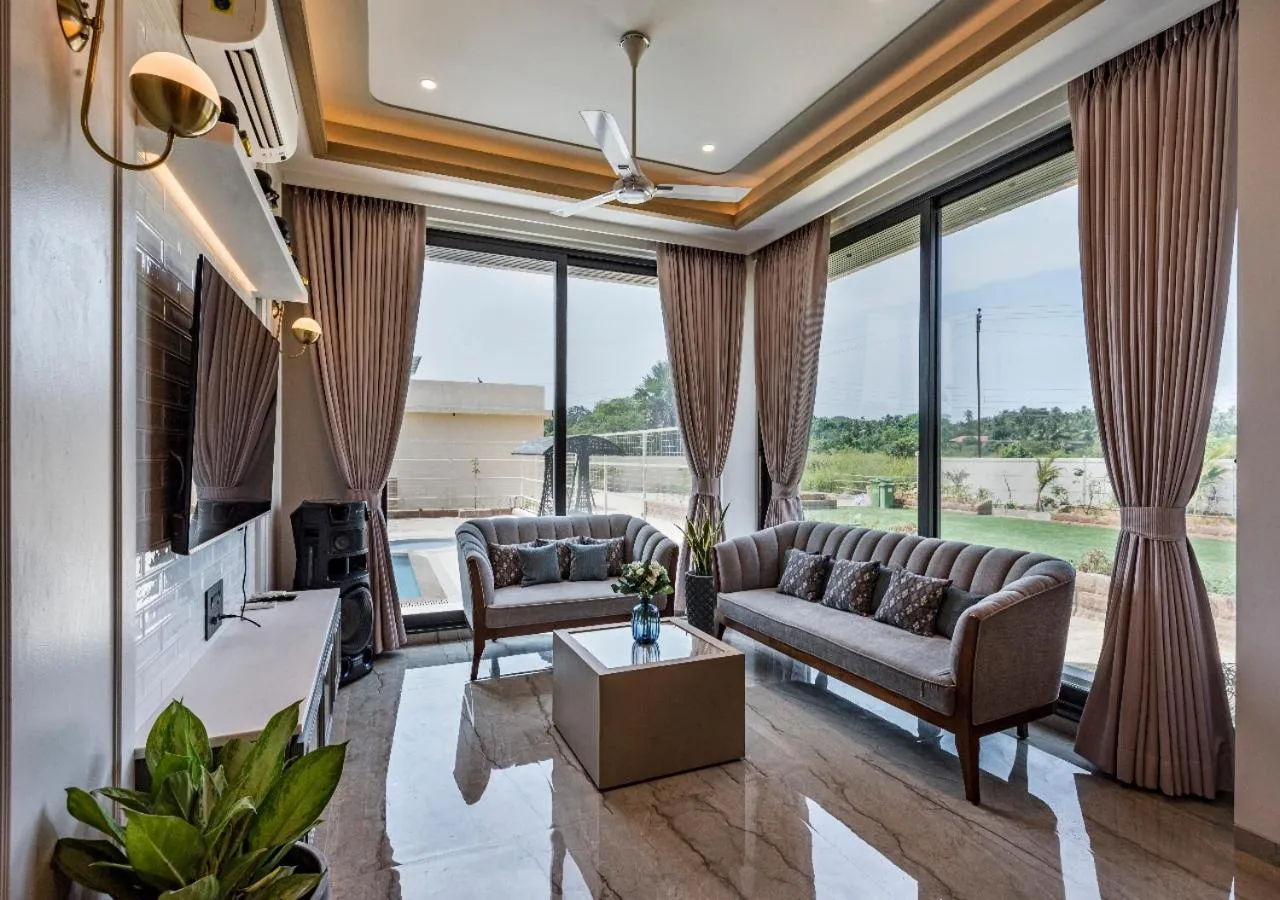 TV and multimedia in SaffronStays Nishta - 4BR pet-friendly villa with pool, turf, gazebo & terrace BBQ views in Alibaug