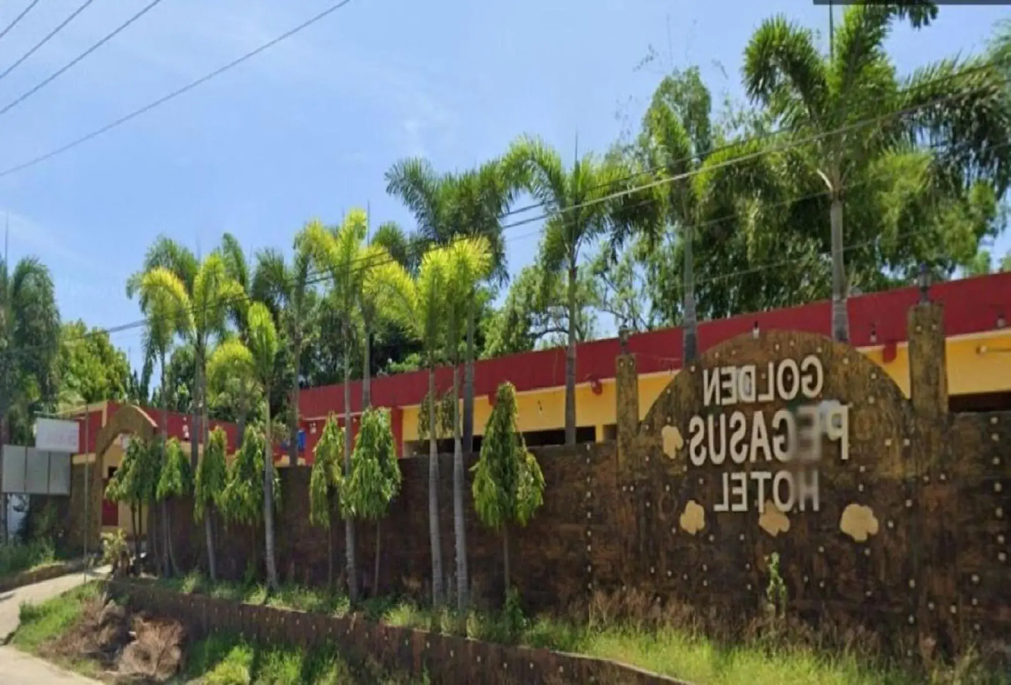 Property building in Golden Pegasus Hotel La Union by RedDoorz Property building in Golden Pegasus Hotel La Union by RedDoorz