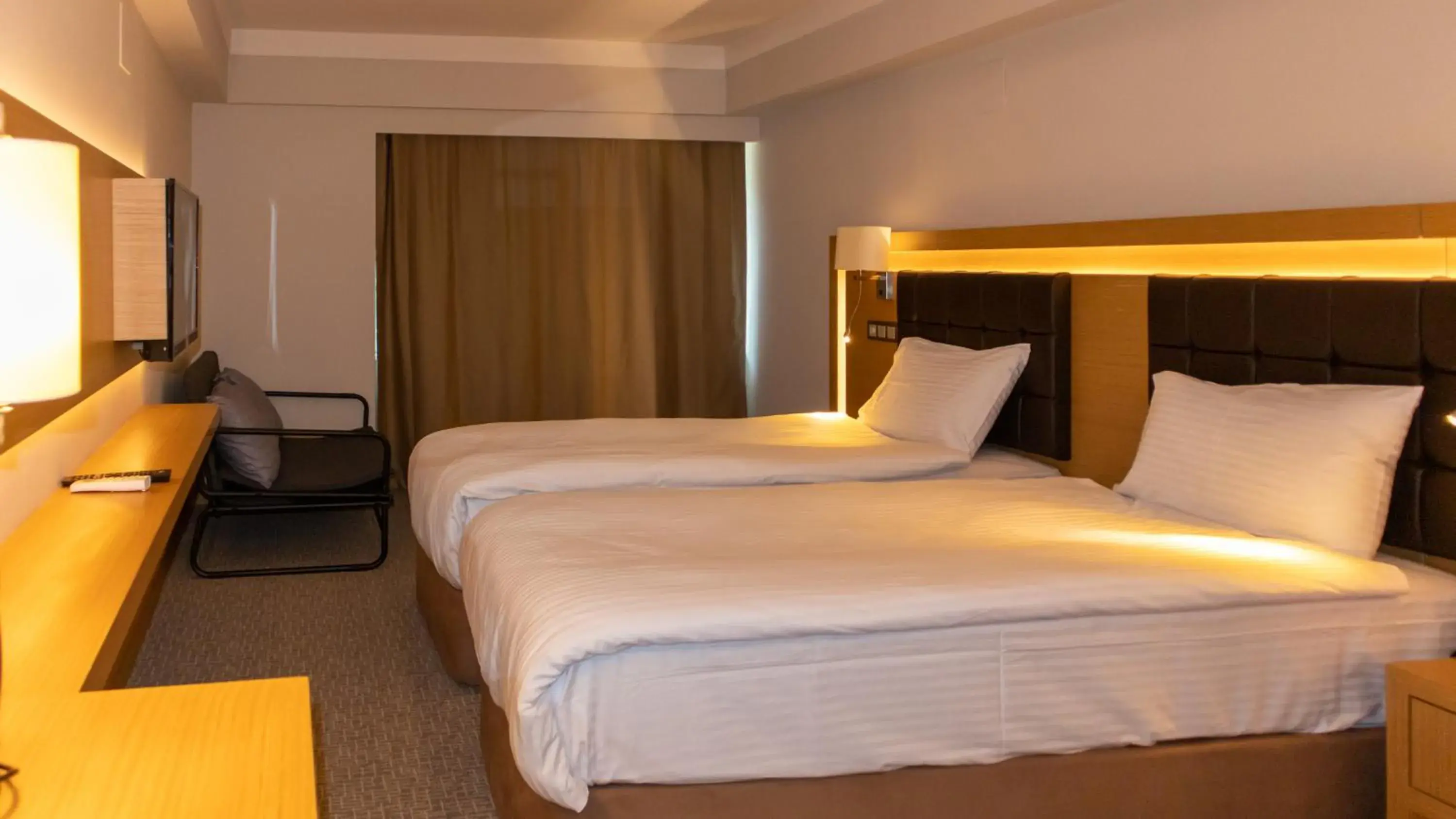 Bed in LOTUSPARK HOTEL Bed in LOTUSPARK HOTEL