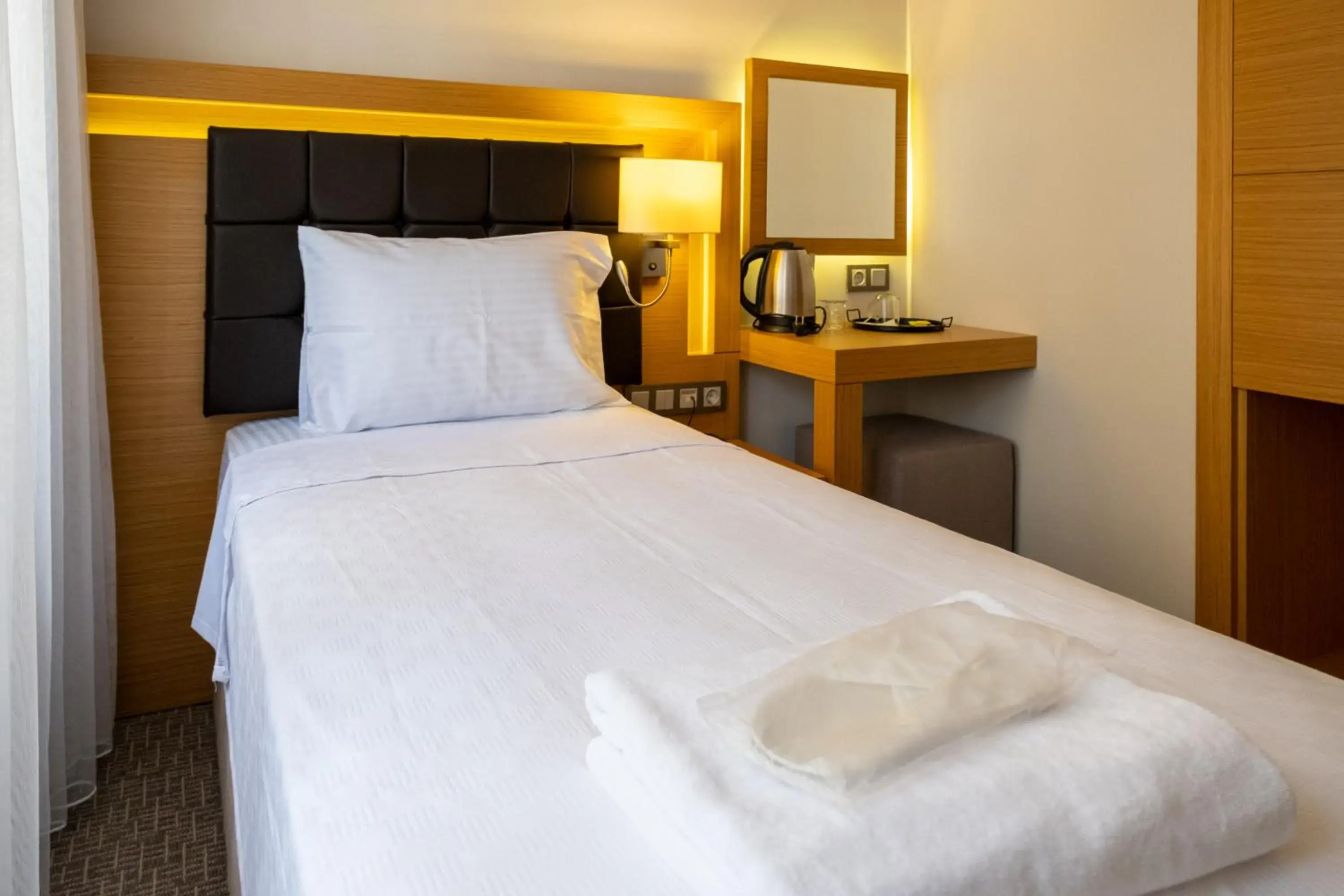 Bed in LOTUSPARK HOTEL Bed in LOTUSPARK HOTEL