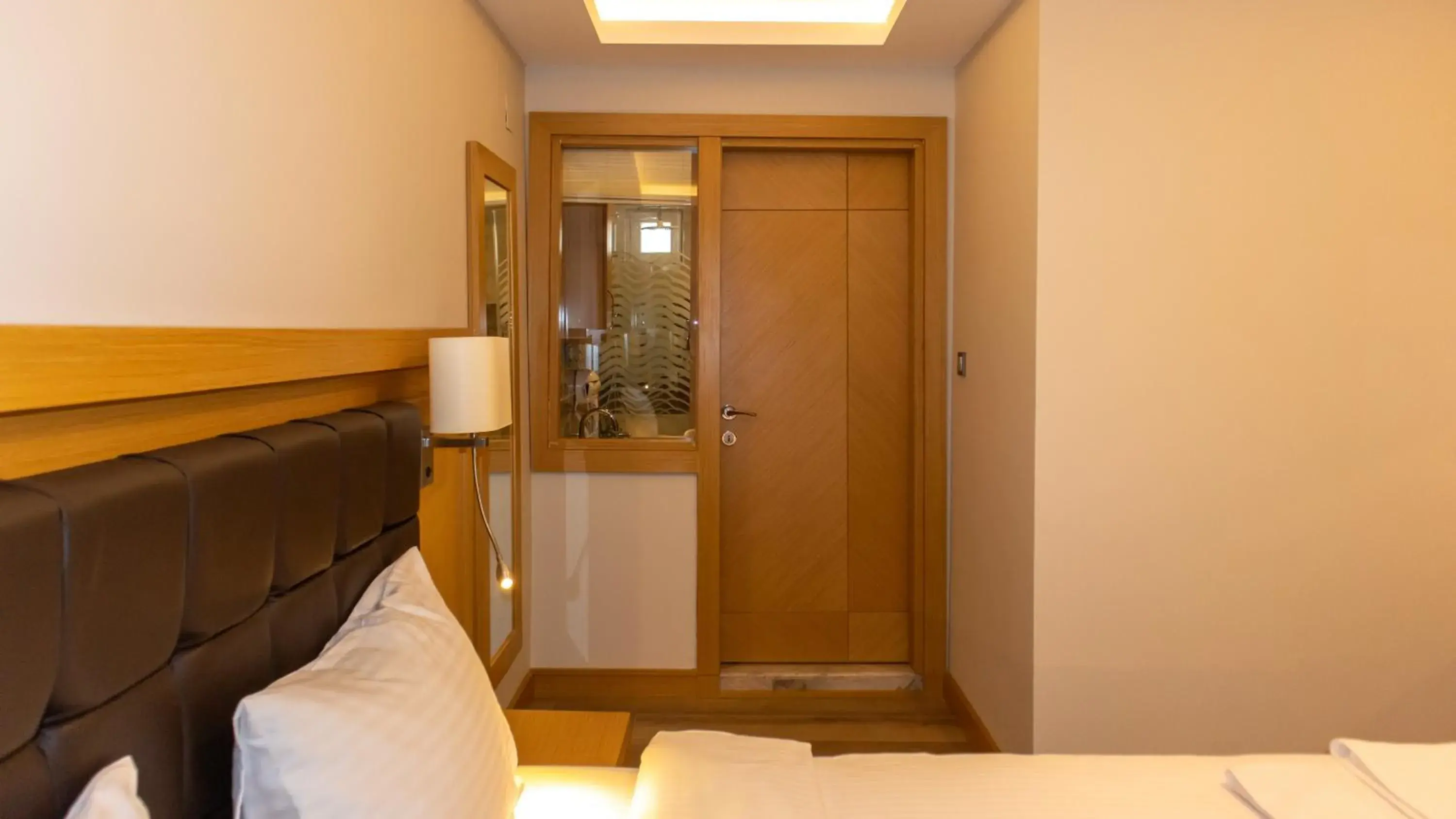 Bed in LOTUSPARK HOTEL Bed in LOTUSPARK HOTEL