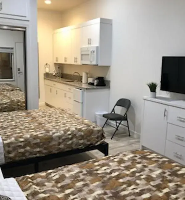 Bed in Villa Alamari Inn and Suites Bed in Villa Alamari Inn and Suites