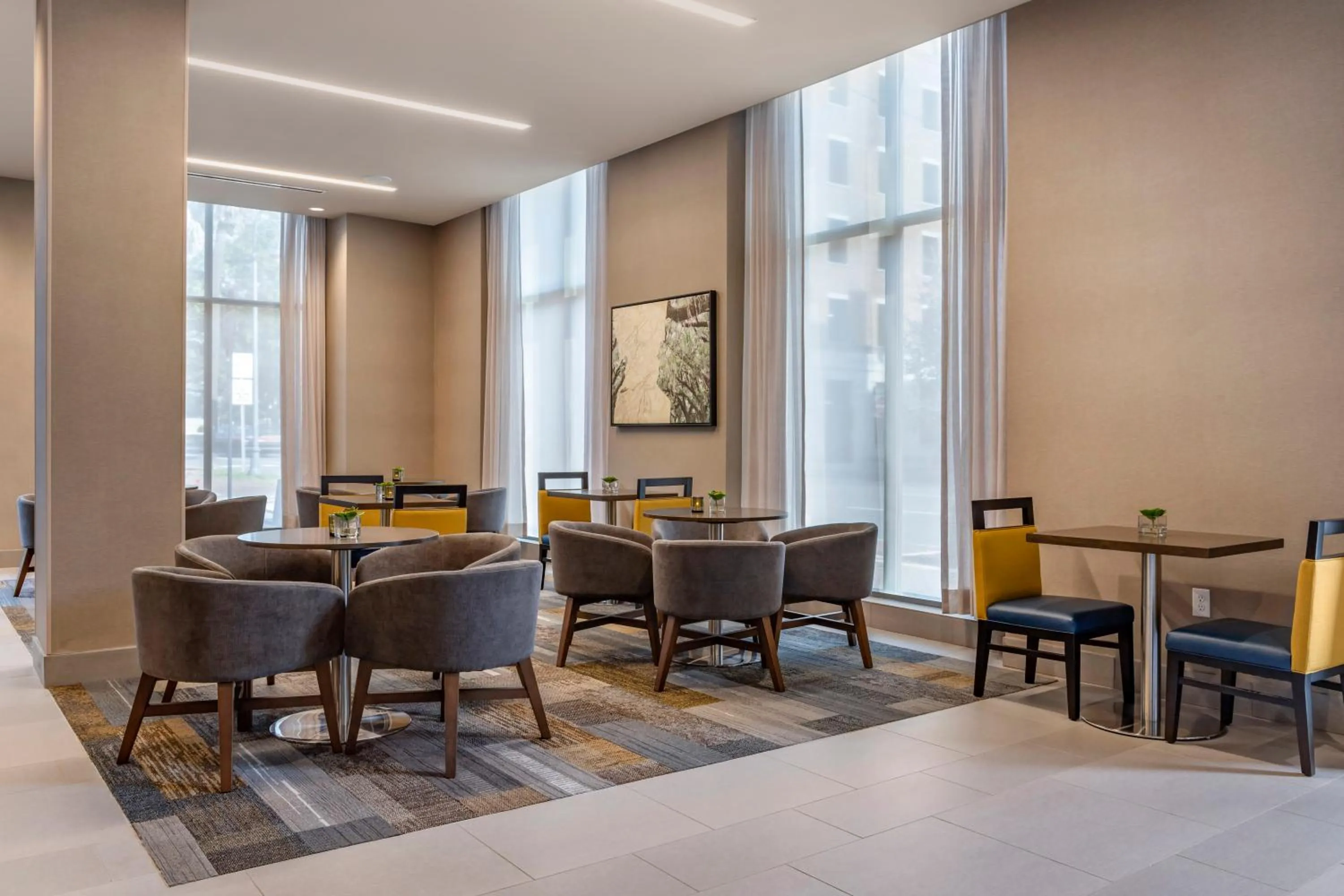 Dining area in Cambria Hotel Savannah Downtown Historic District