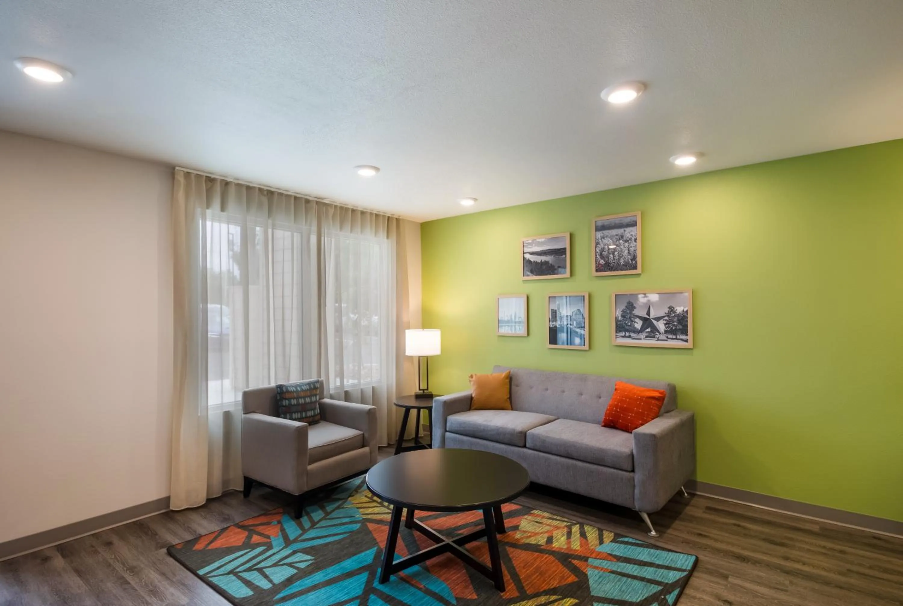 Seating area in WoodSpring Suites Austin Central