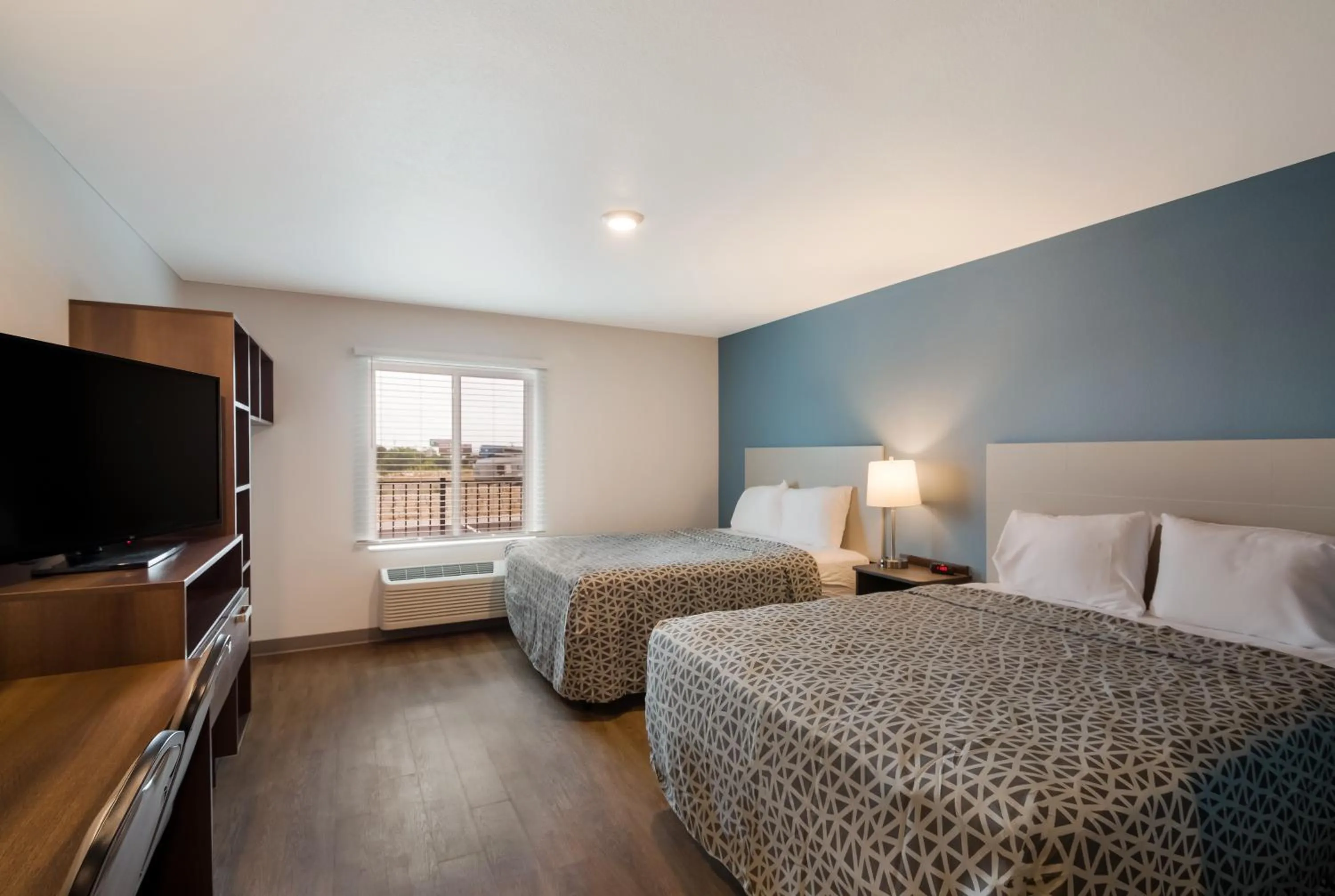 Bedroom, Bed in WoodSpring Suites Austin Central
