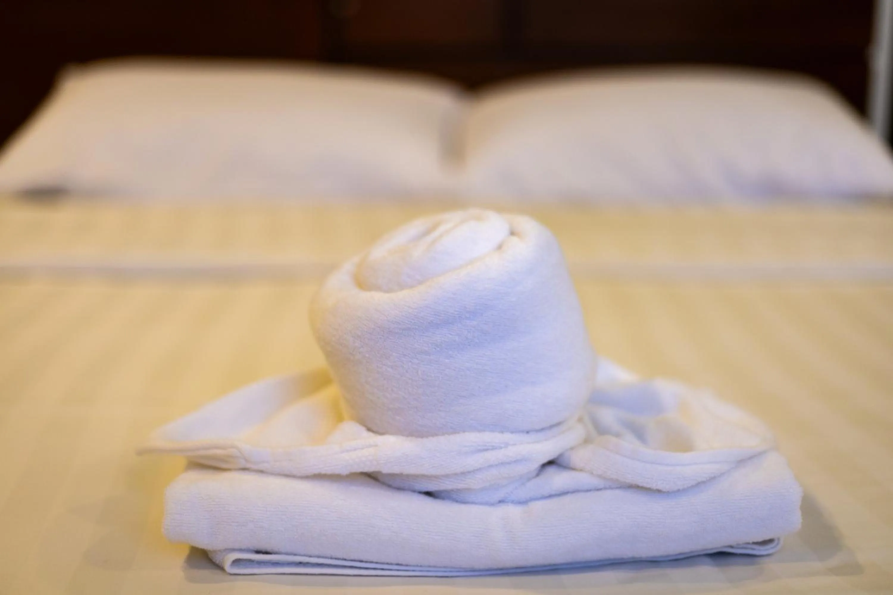 towels, Bed in Kayong's Inn