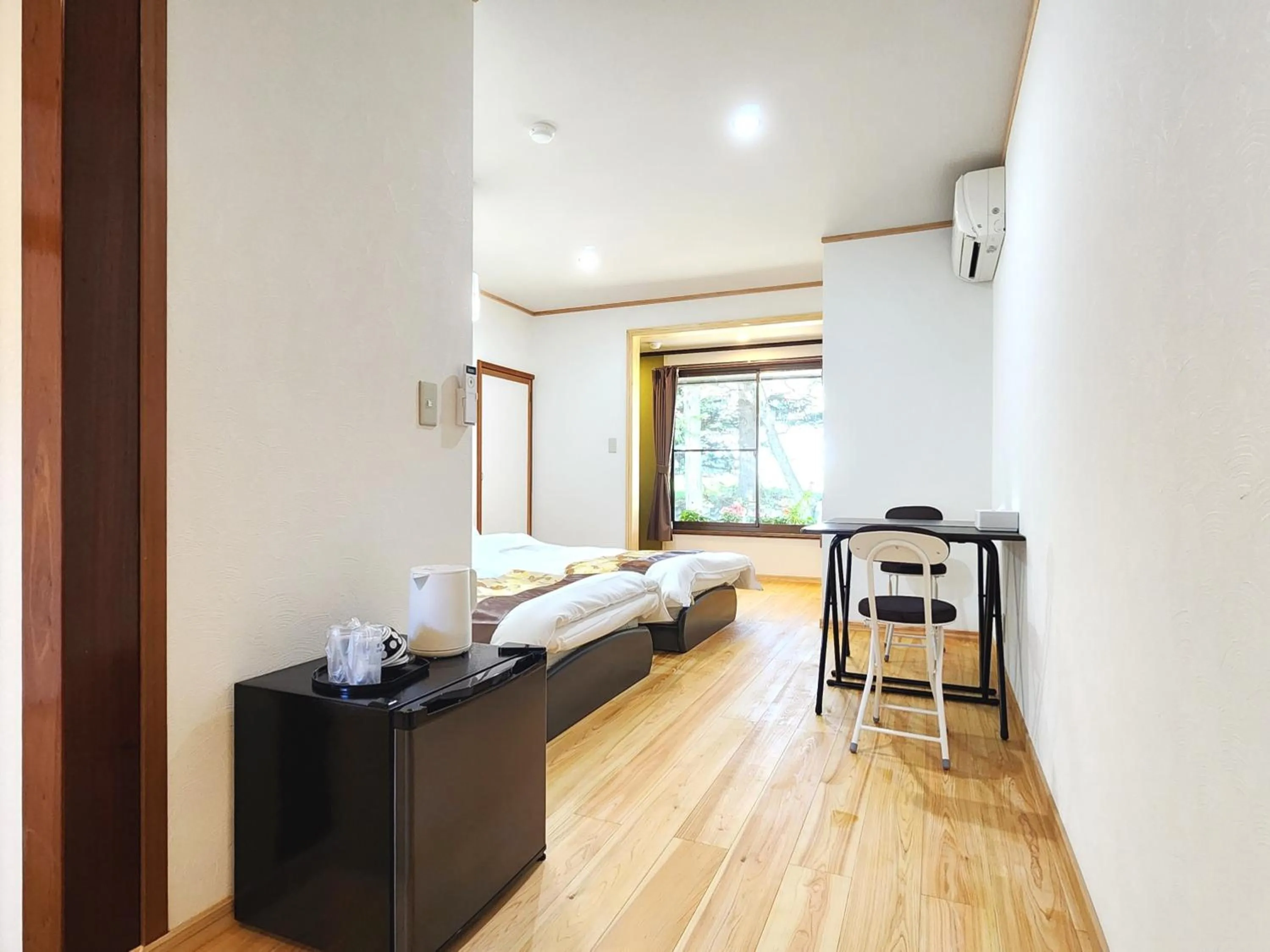 Photo of the whole room, Bed in Guest Room Furusatomura Kogeikan