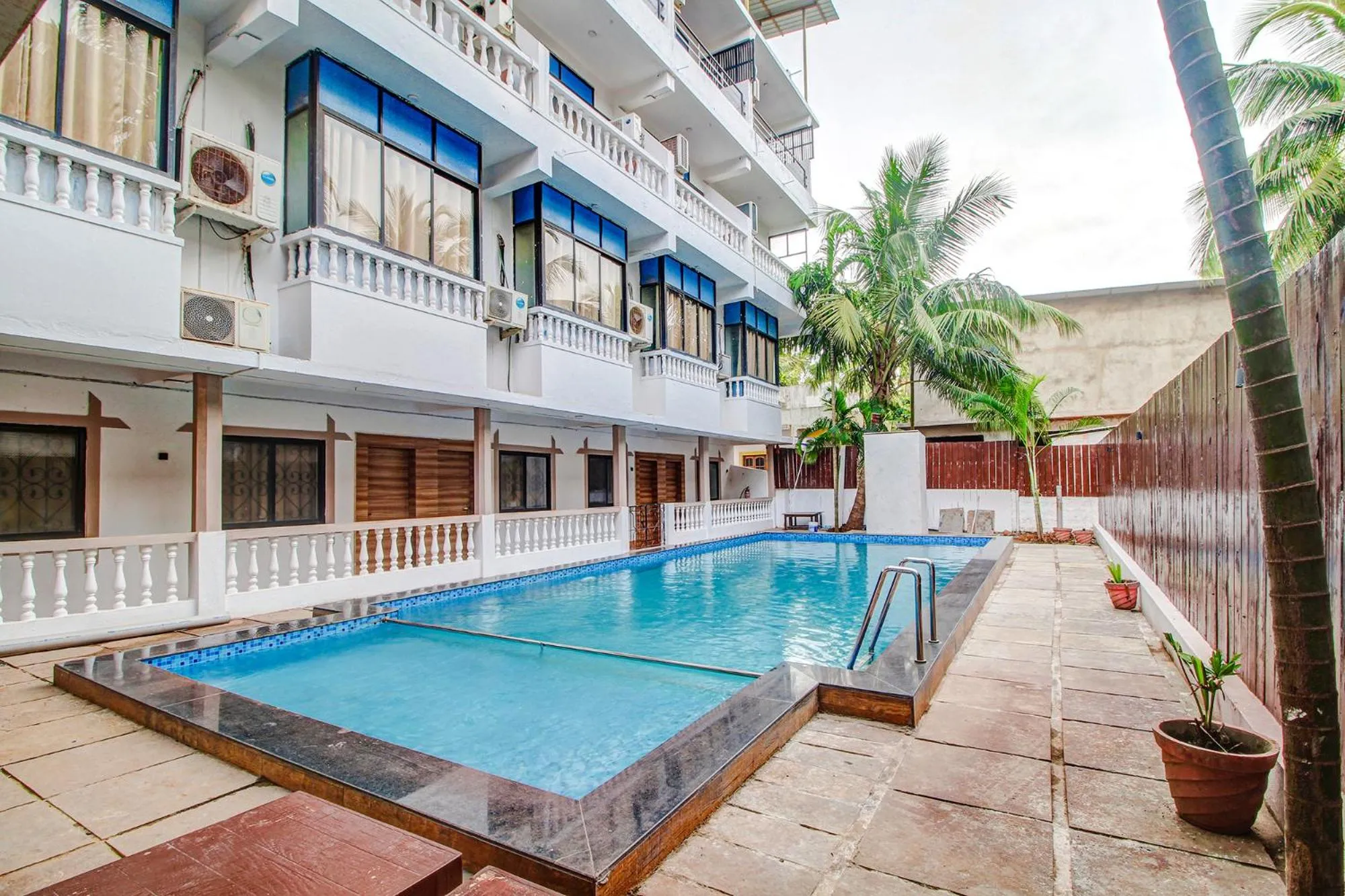 Property building, Swimming Pool in FabHotel Pleasure Inn