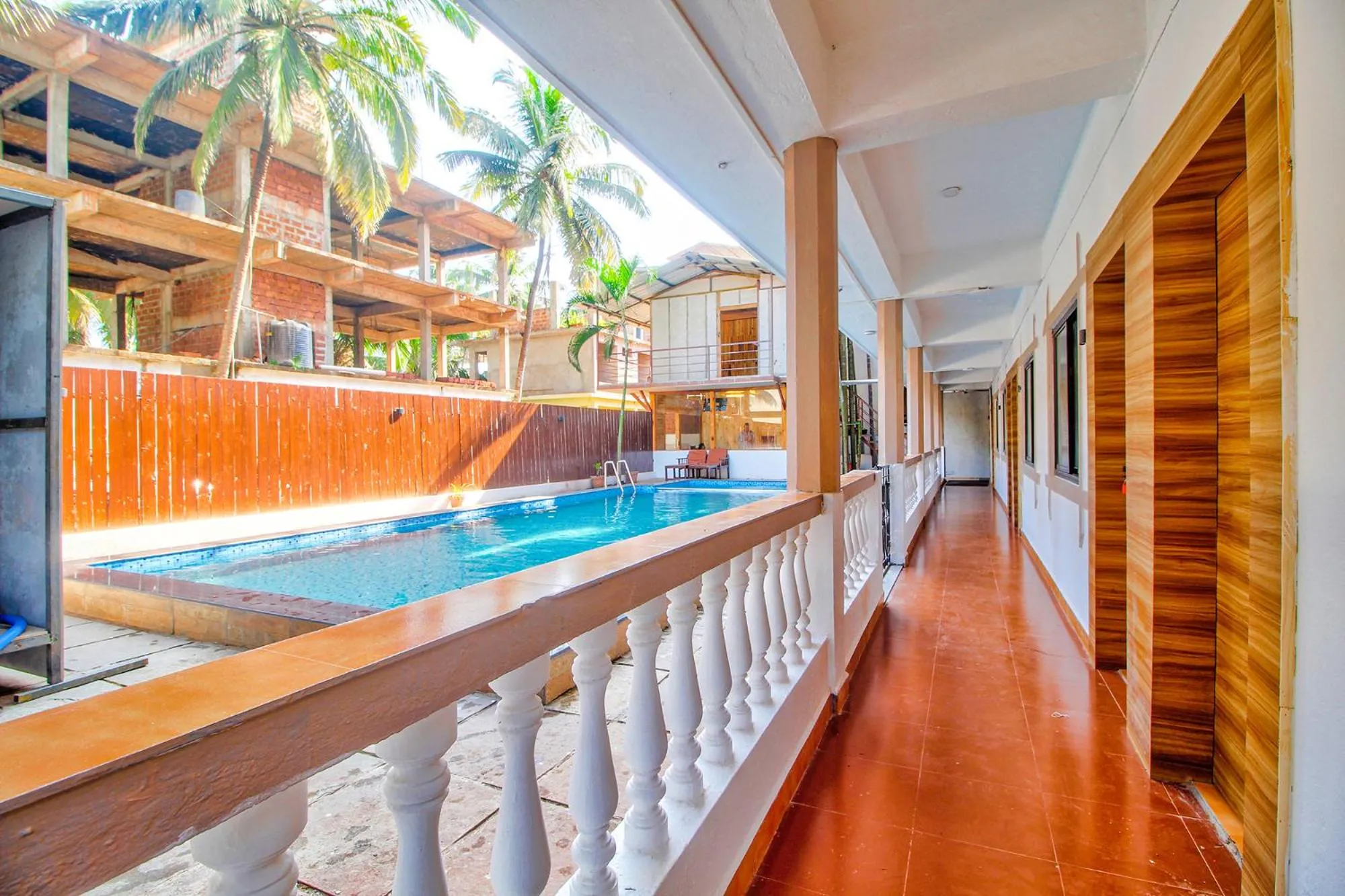 Balcony/Terrace, Swimming Pool in FabHotel Pleasure Inn