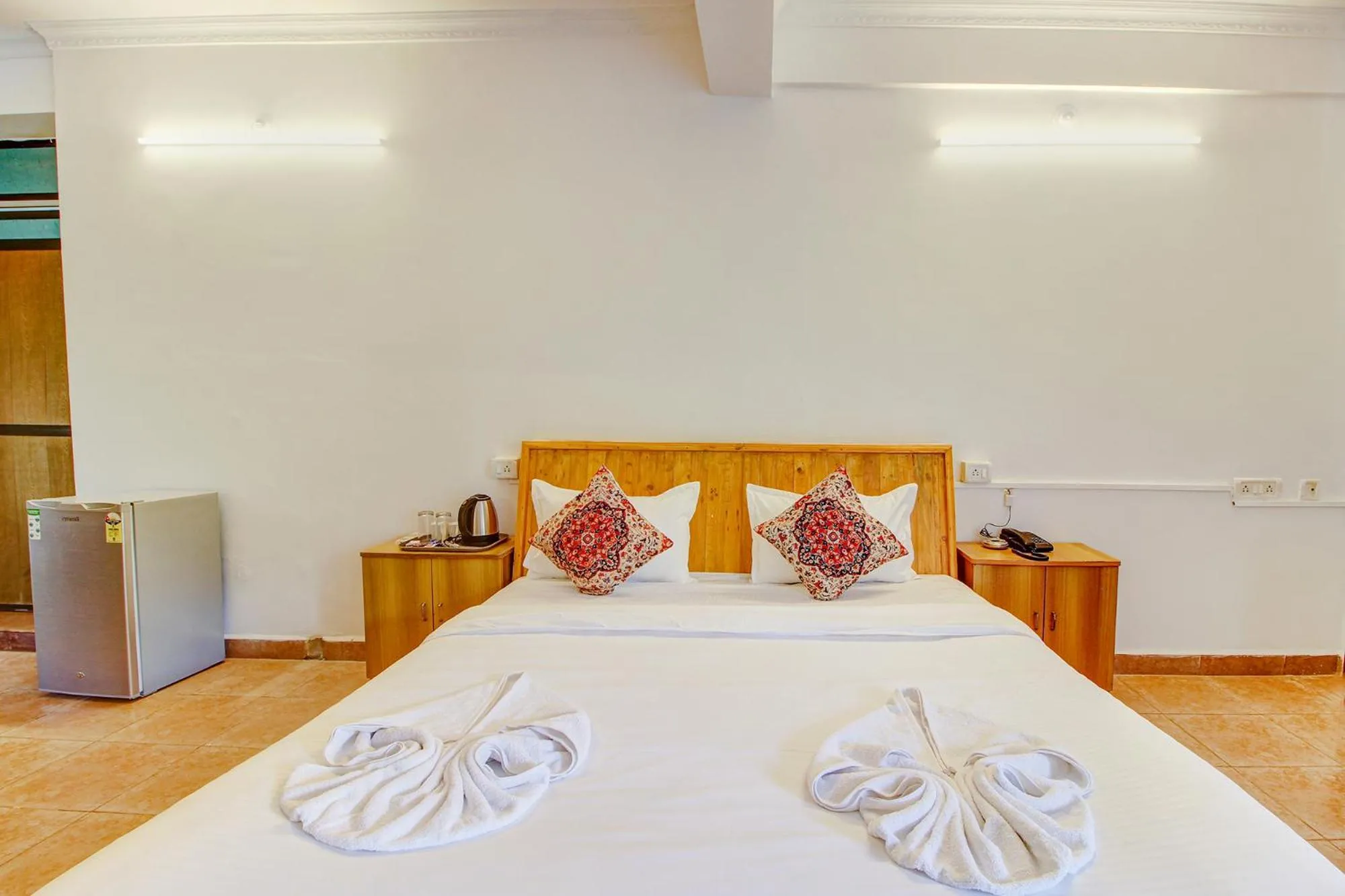 Bed in FabHotel Pleasure Inn