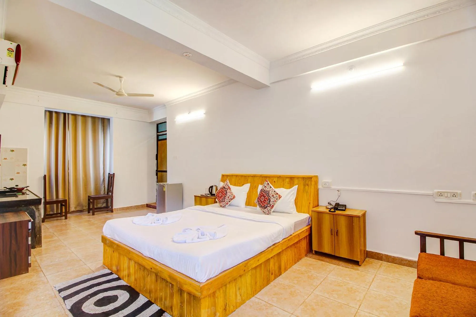 Bed in FabHotel Pleasure Inn