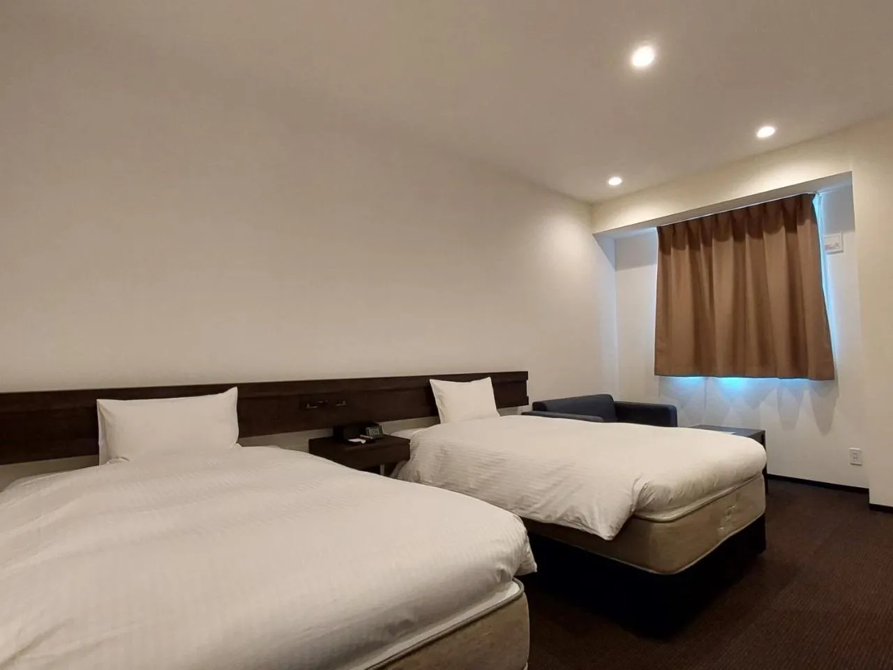 Bed in The Legato Inn MIFUNE