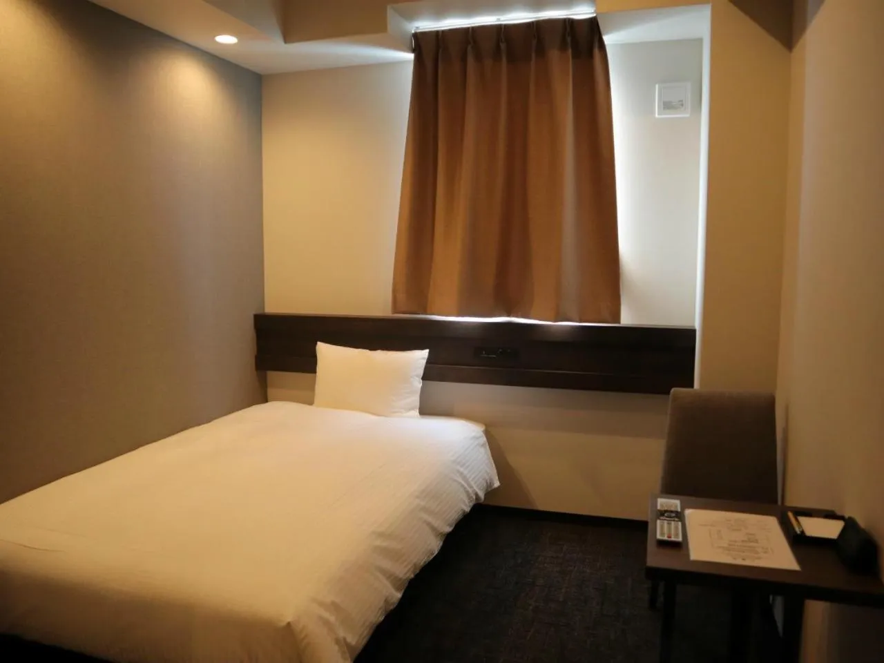 Bed in The Legato Inn MIFUNE