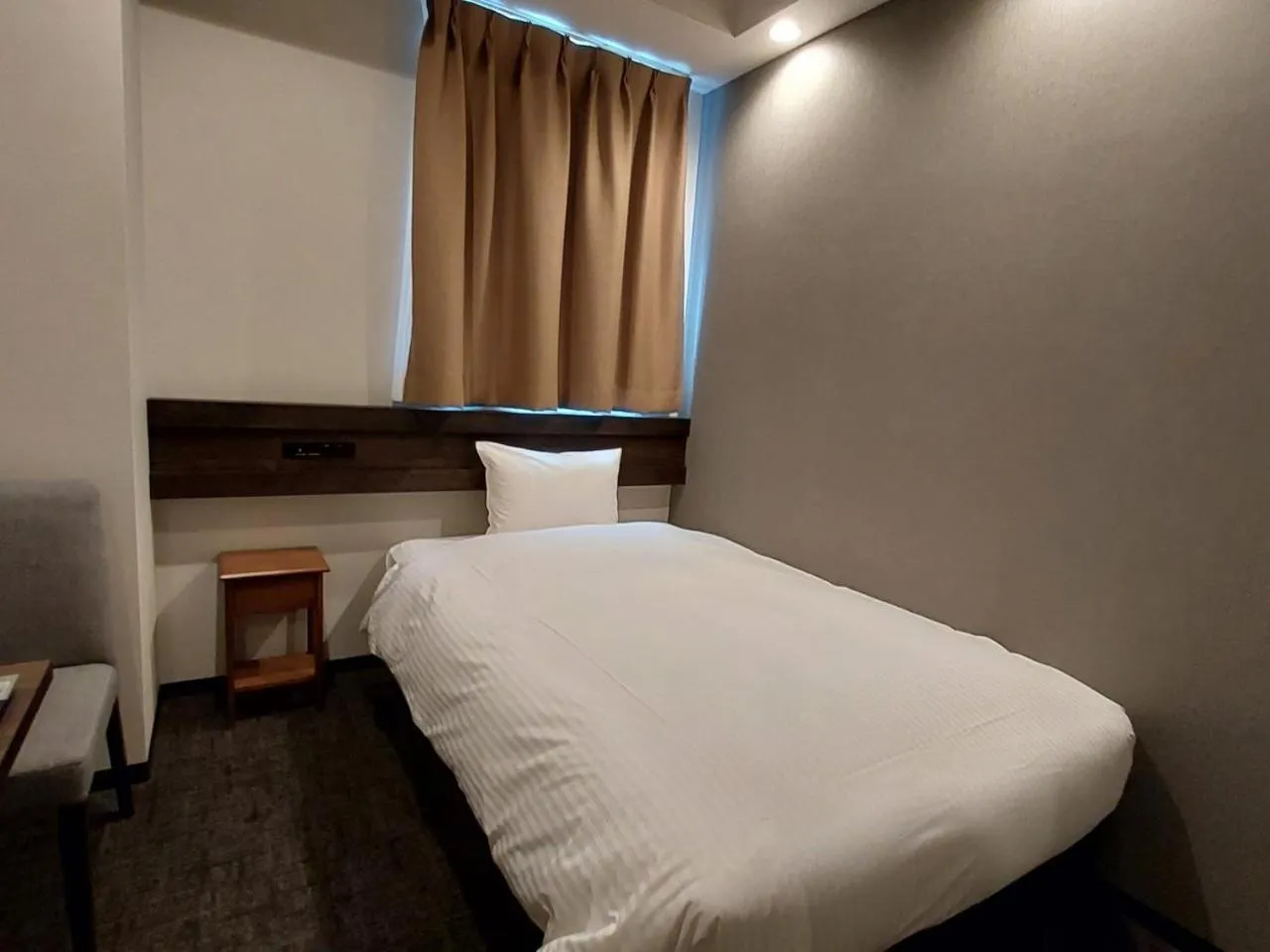 Bed in The Legato Inn MIFUNE