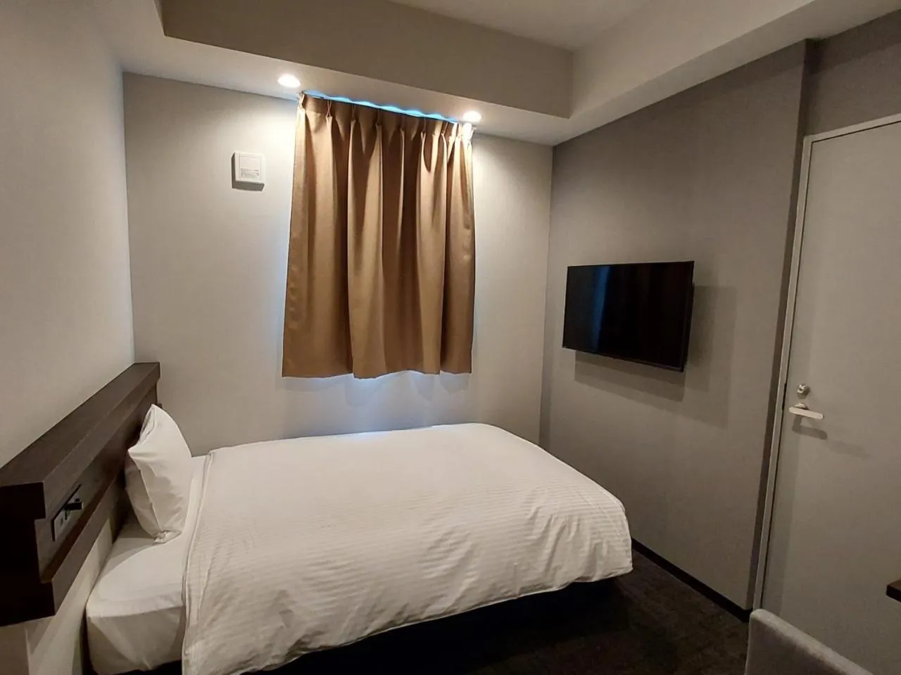 Bed in The Legato Inn MIFUNE