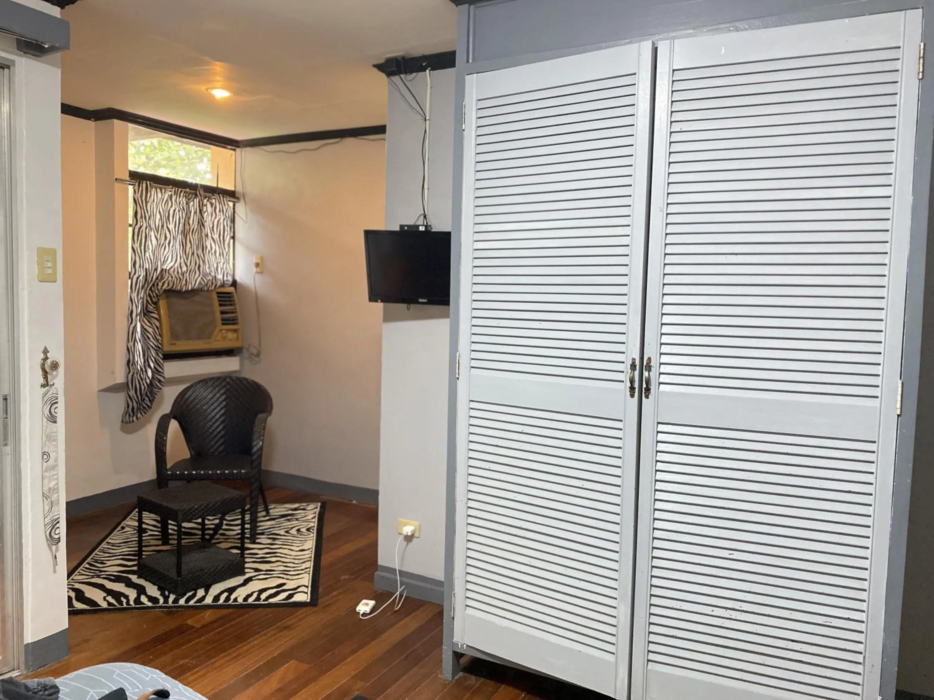 Seating area in La Vista Pansol Resort Complex by RedDoorz