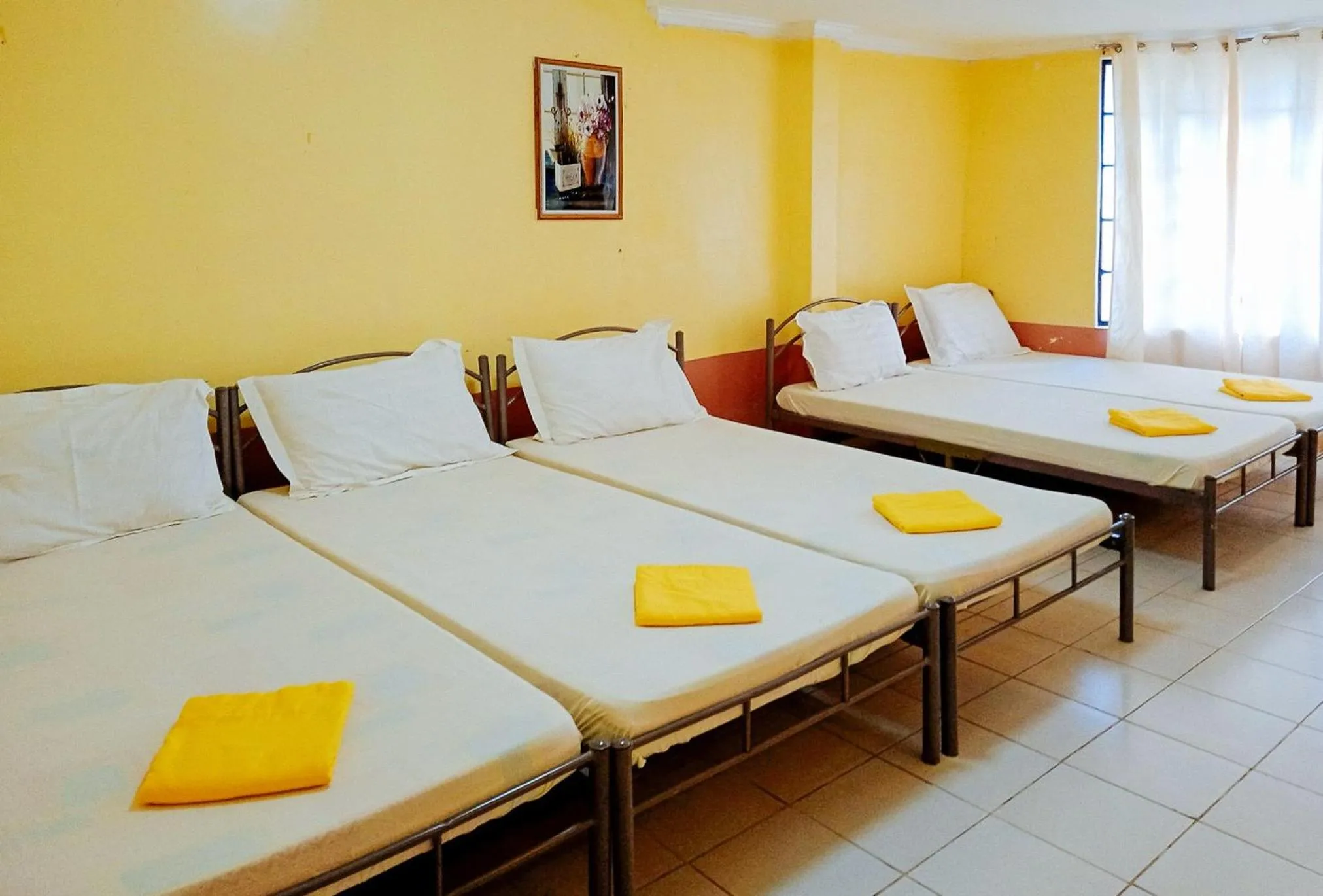 Bedroom, Bed in La Vista Pansol Resort Complex by RedDoorz