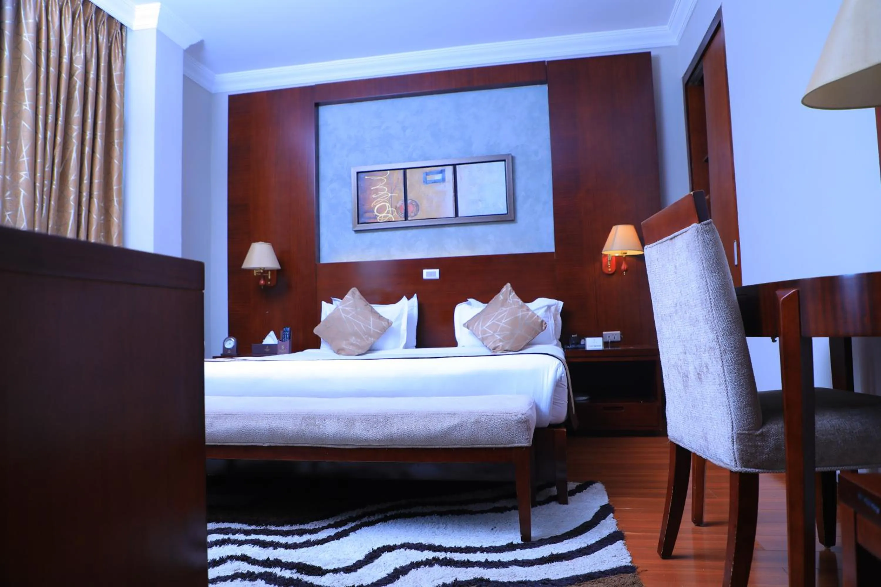 Bed in Sidra International Hotel
