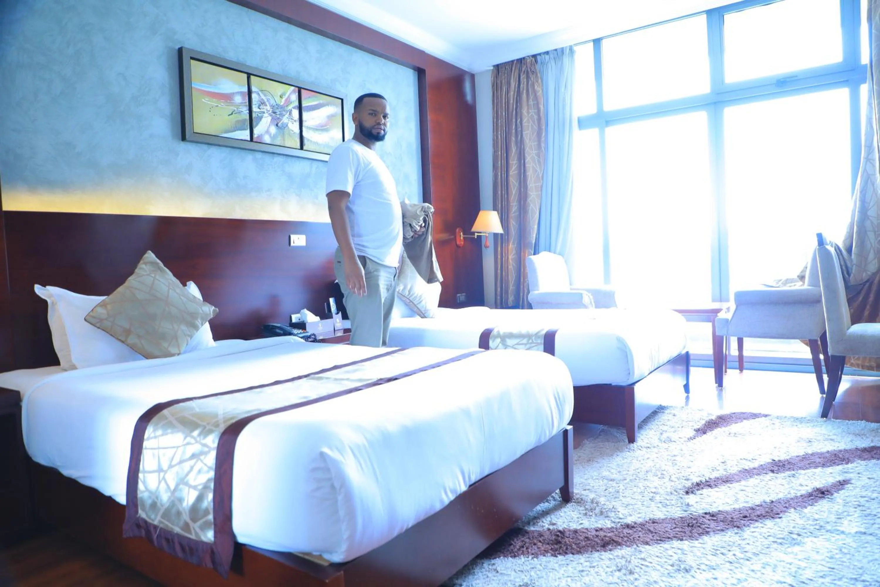 Bed in Sidra International Hotel