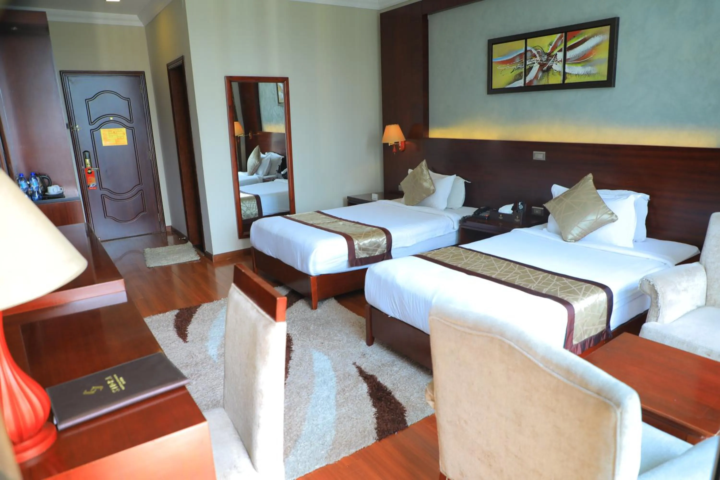 Bed in Sidra International Hotel