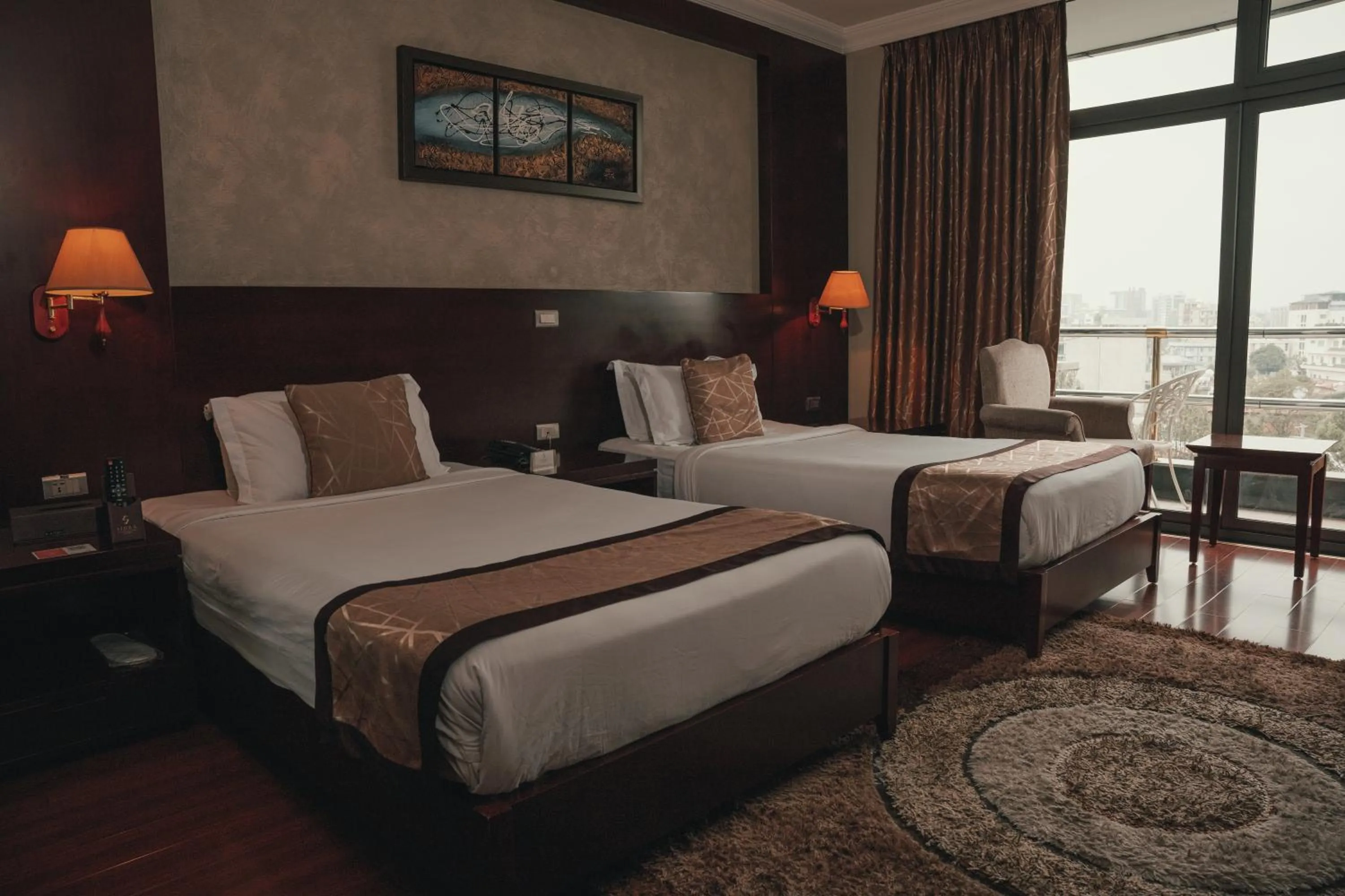Bed in Sidra International Hotel