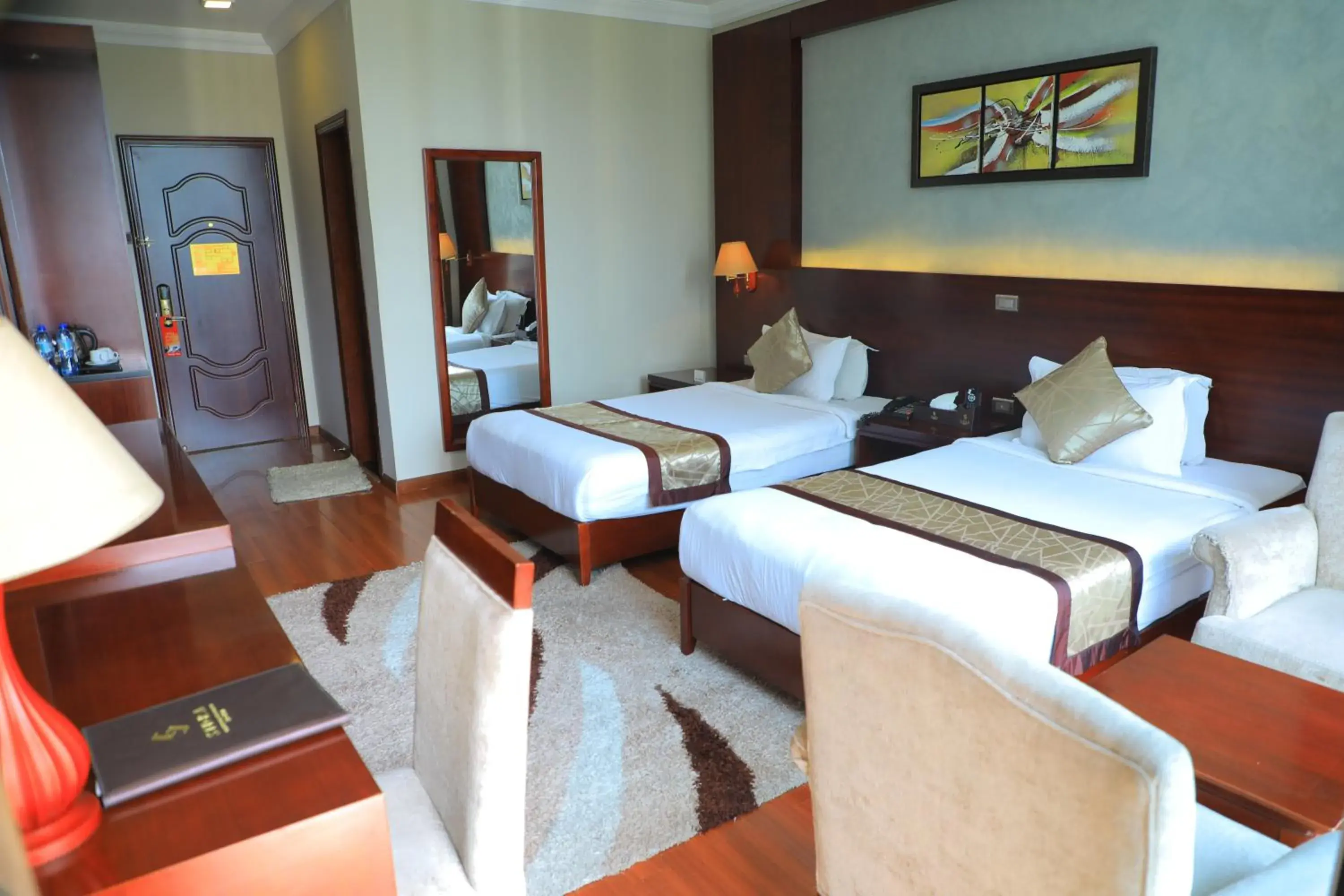 Deluxe Twin Room in Sidra International Hotel Deluxe Twin Room in Sidra International Hotel