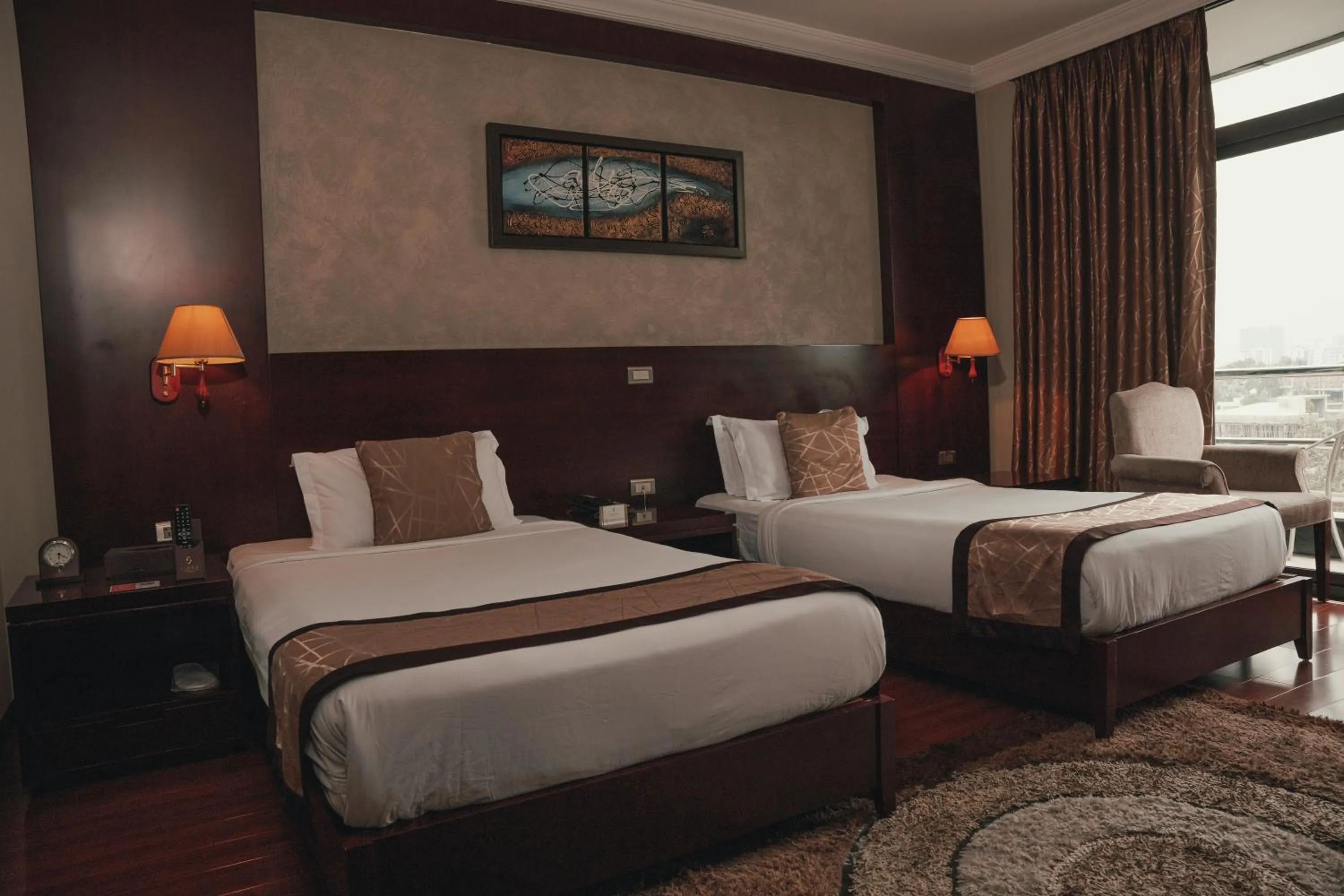 Bed in Sidra International Hotel