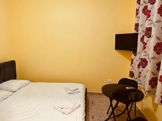 Bed in Auto Tana Guest House