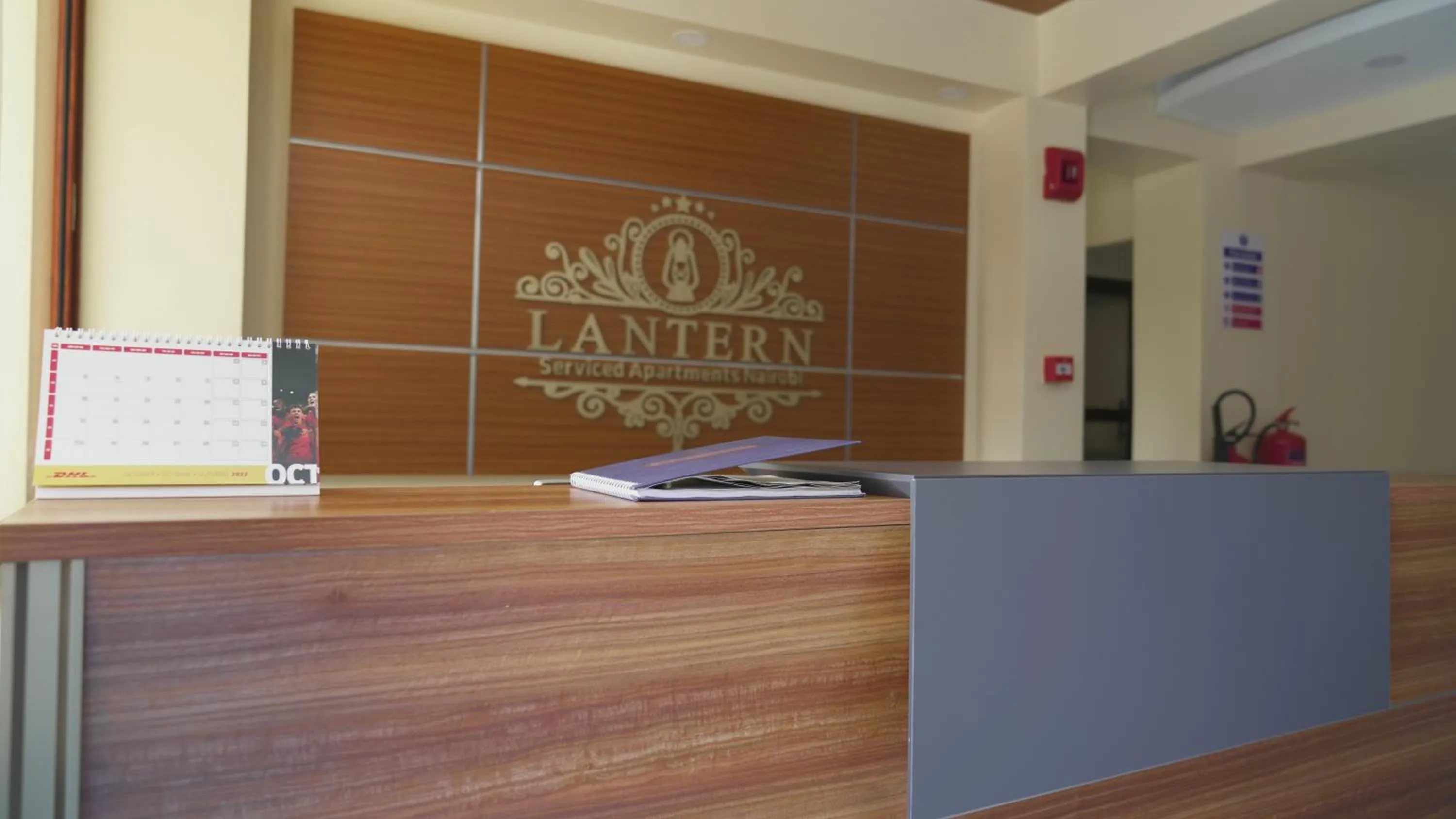 Property logo or sign in Lantern Serviced Apartments