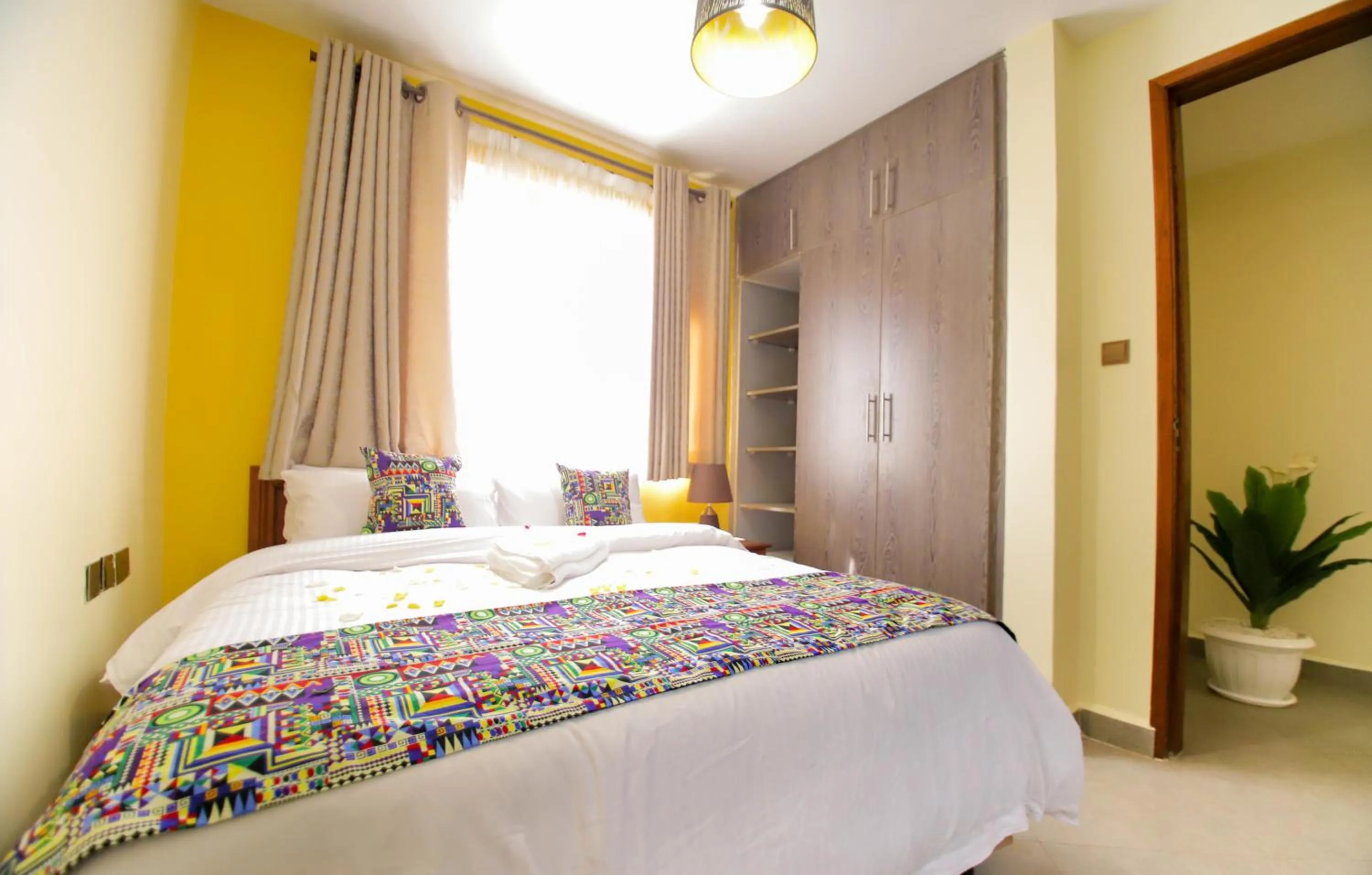 Bed in Lantern Serviced Apartments