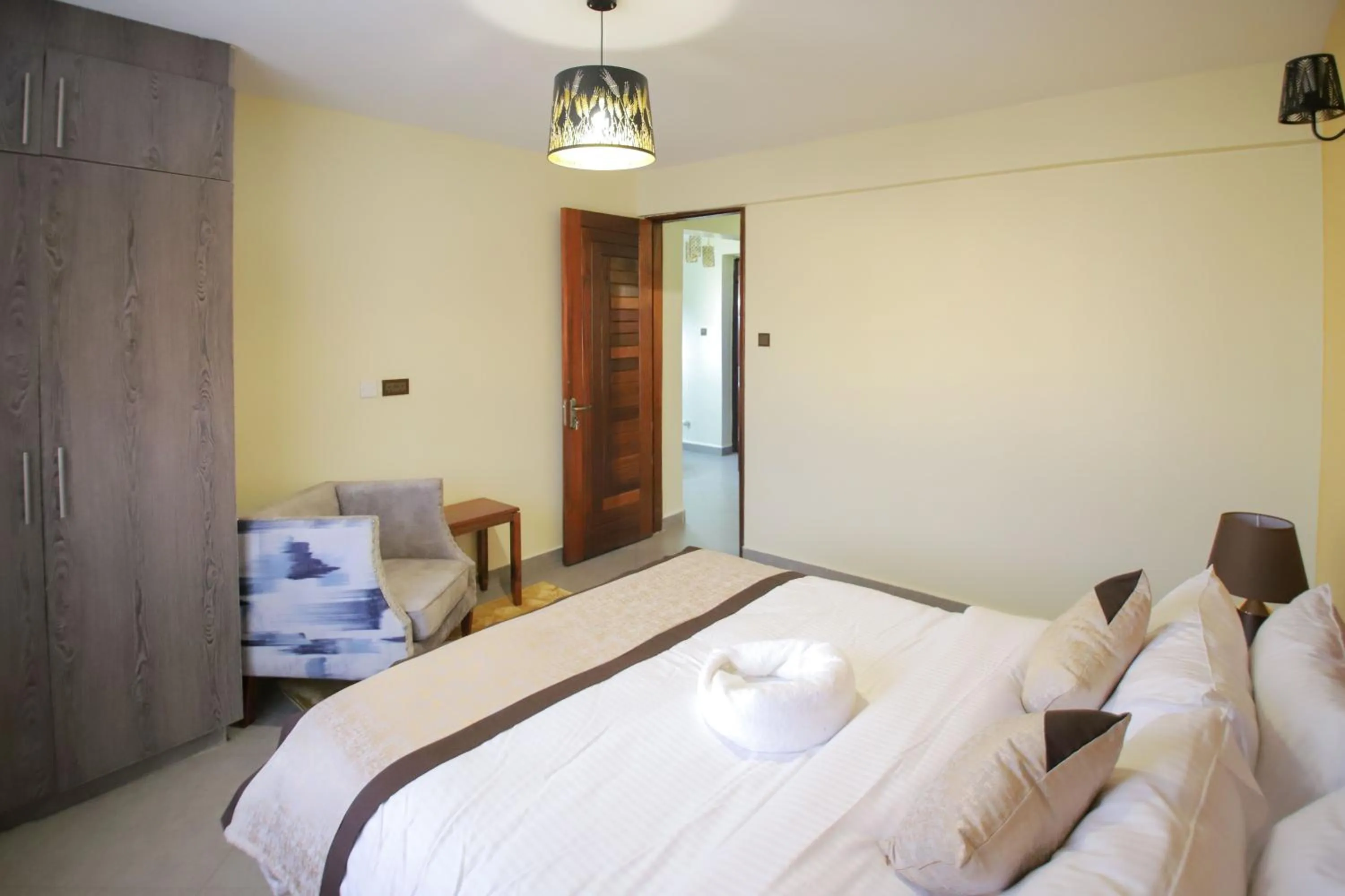 Bed in Lantern Serviced Apartments