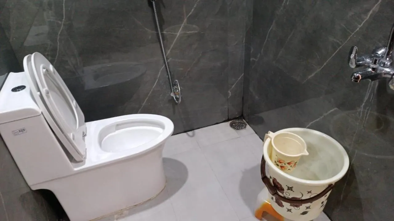 Toilet, Bathroom in Hotel Cross Road By WB Inn