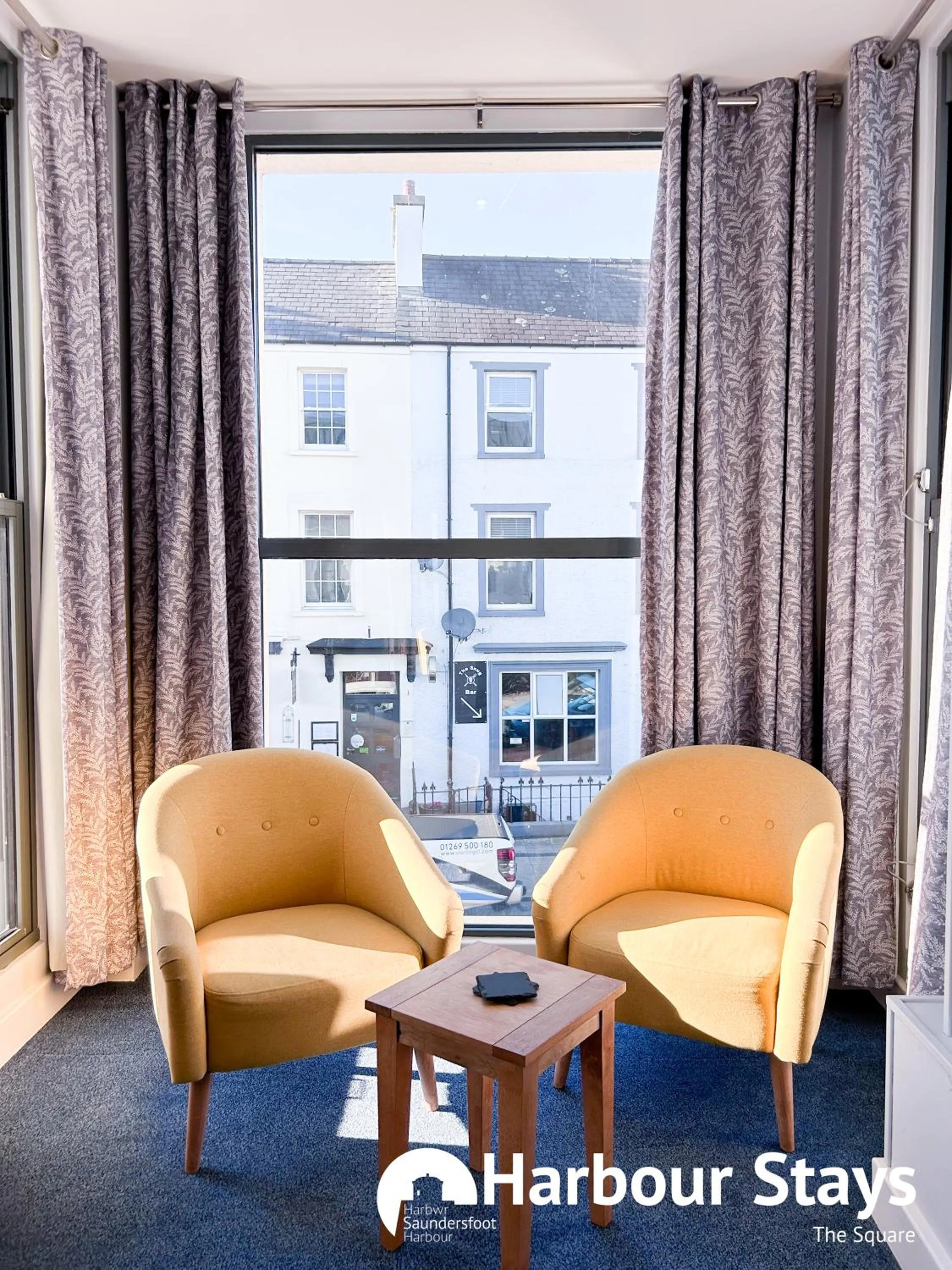 Seating area in Harbour Stays at Ocean Square