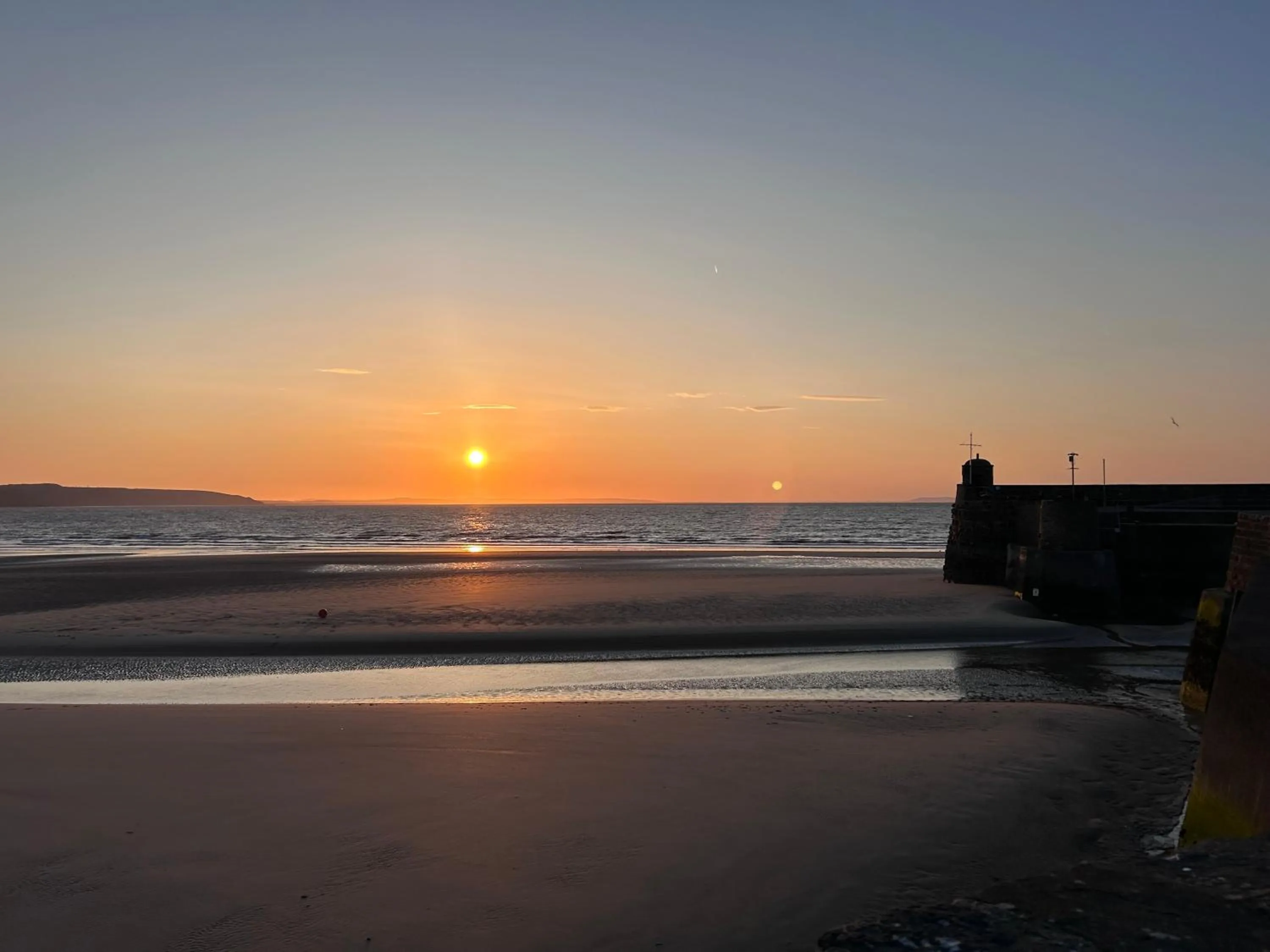 Sunrise in Harbour Stays at Ocean Square