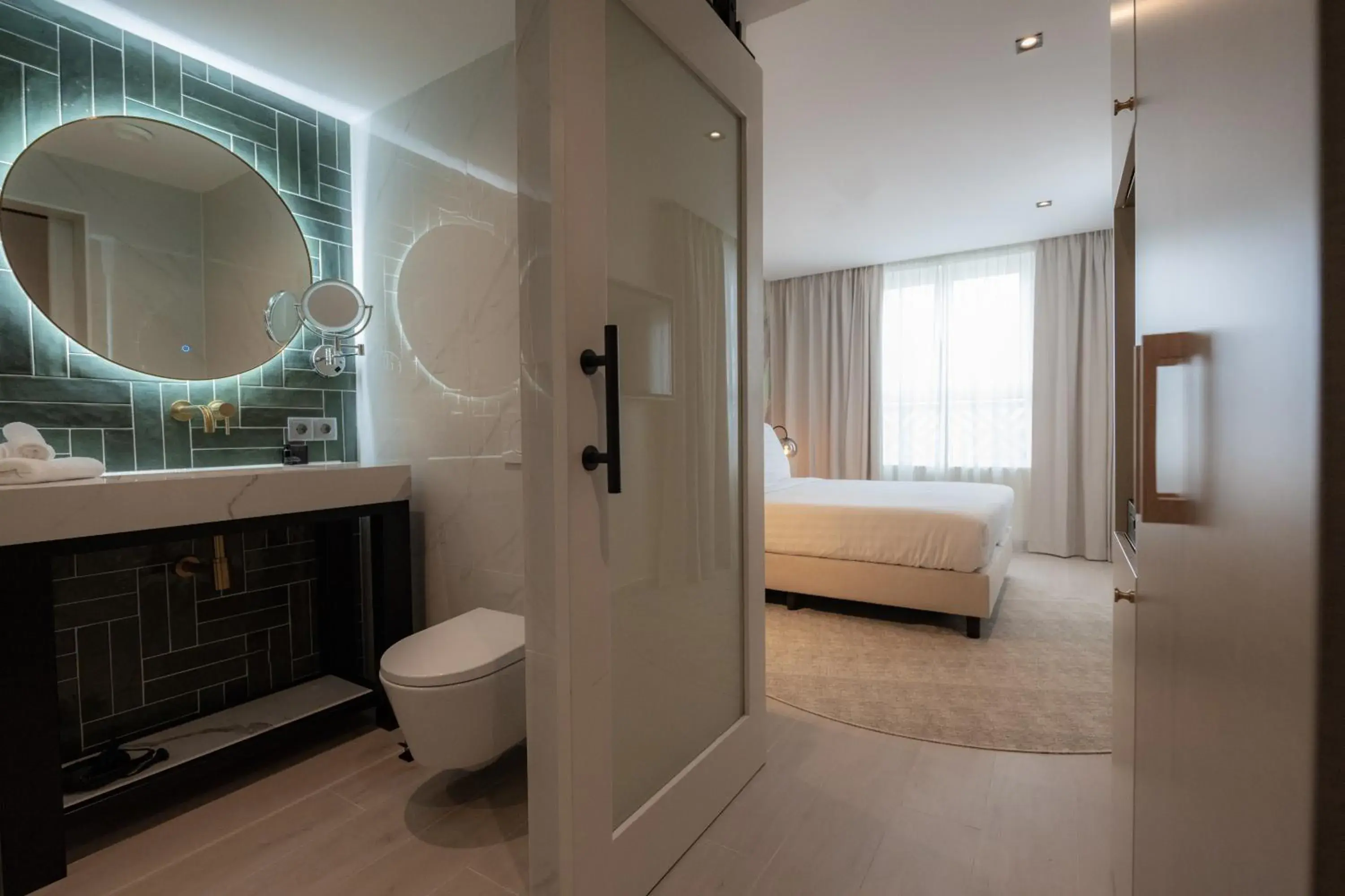 Toilet, Bed in Harbor Hotel & Casino Curacao Toilet, Bed in Harbor Hotel & Casino Curacao