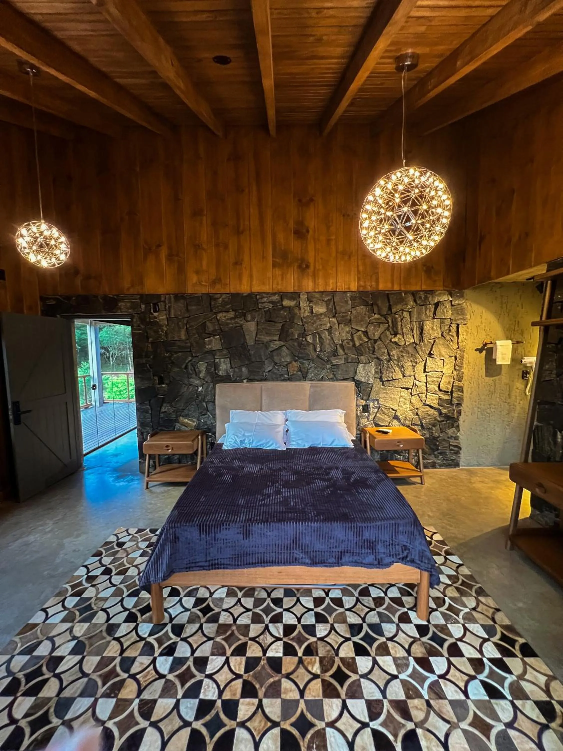 Bed in WoodStone Hotel Fazenda