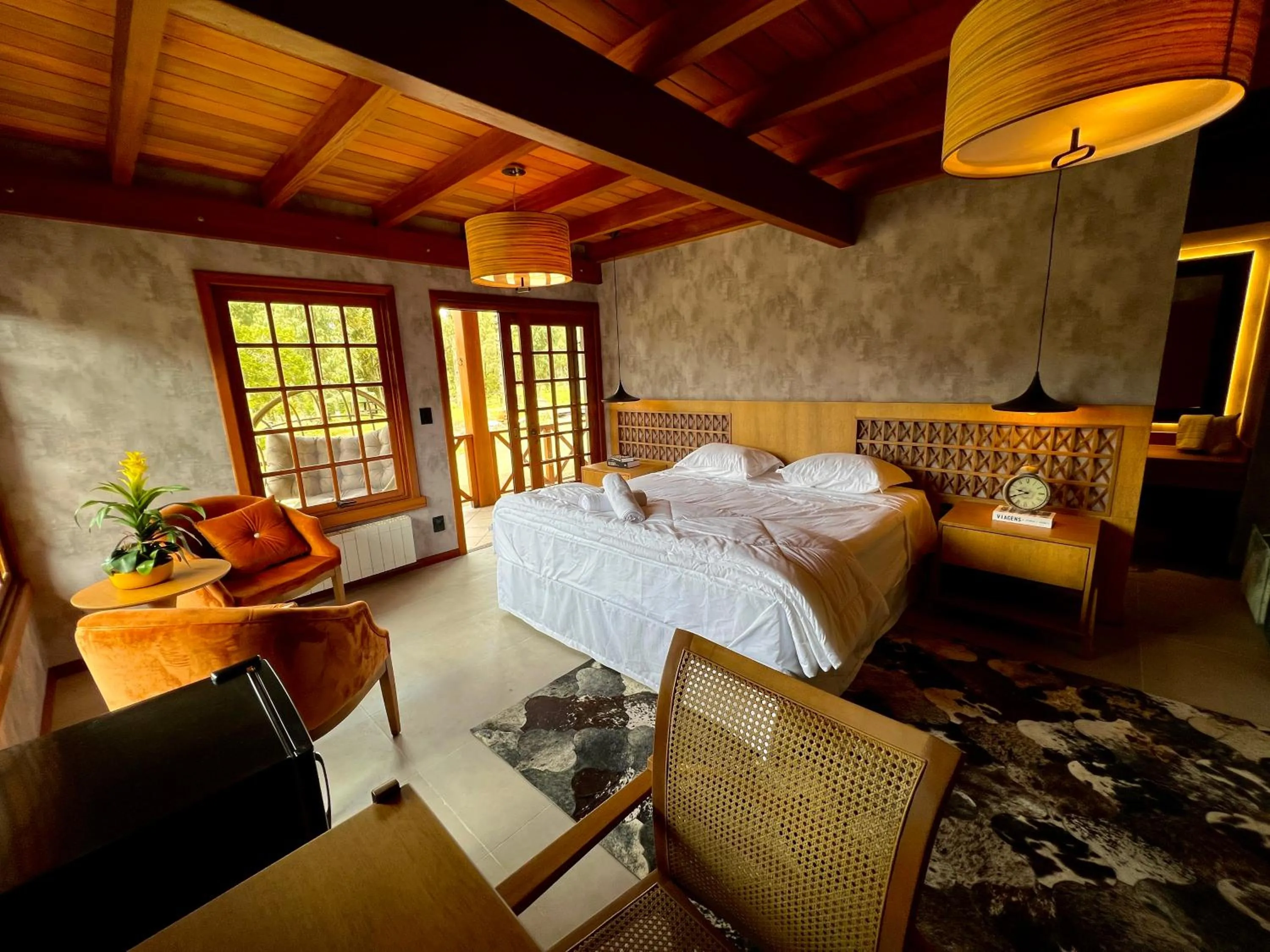 Bed in WoodStone Hotel Fazenda