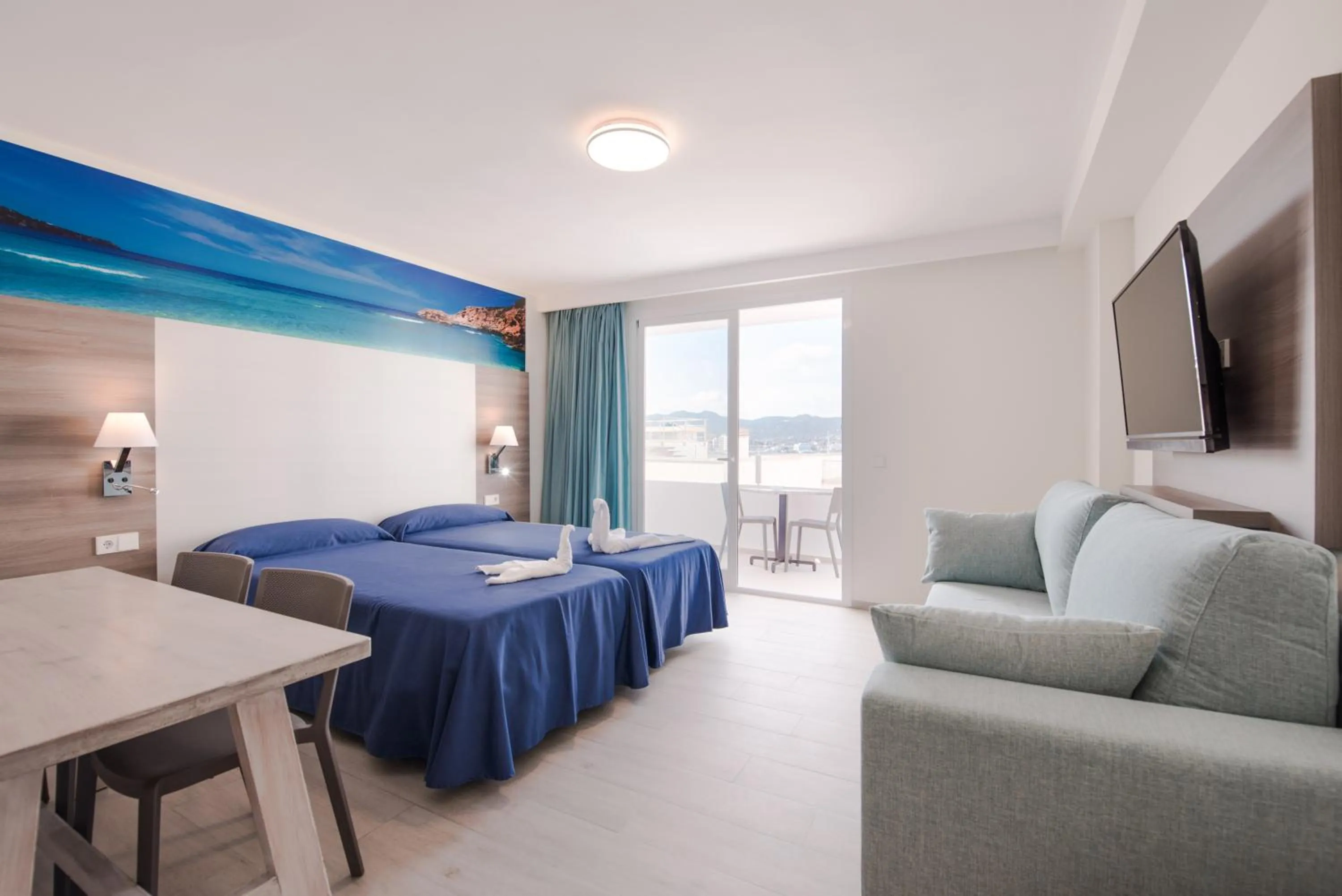 Living room, Bed in Apartamentos Los Angeles